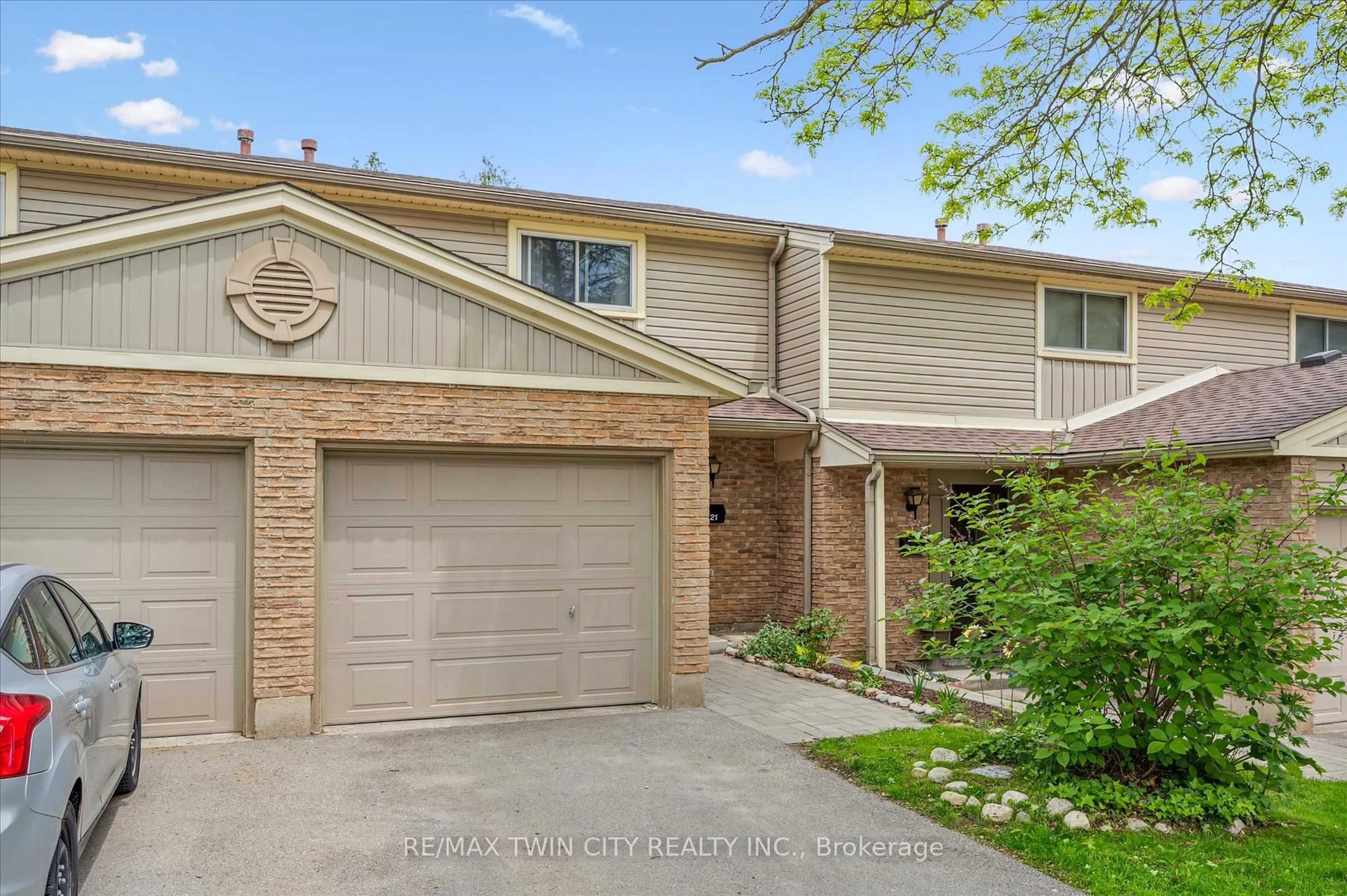 Home with brick exterior material, street for 223 Pioneer Dr, Kitchener Ontario N2P 1L9
