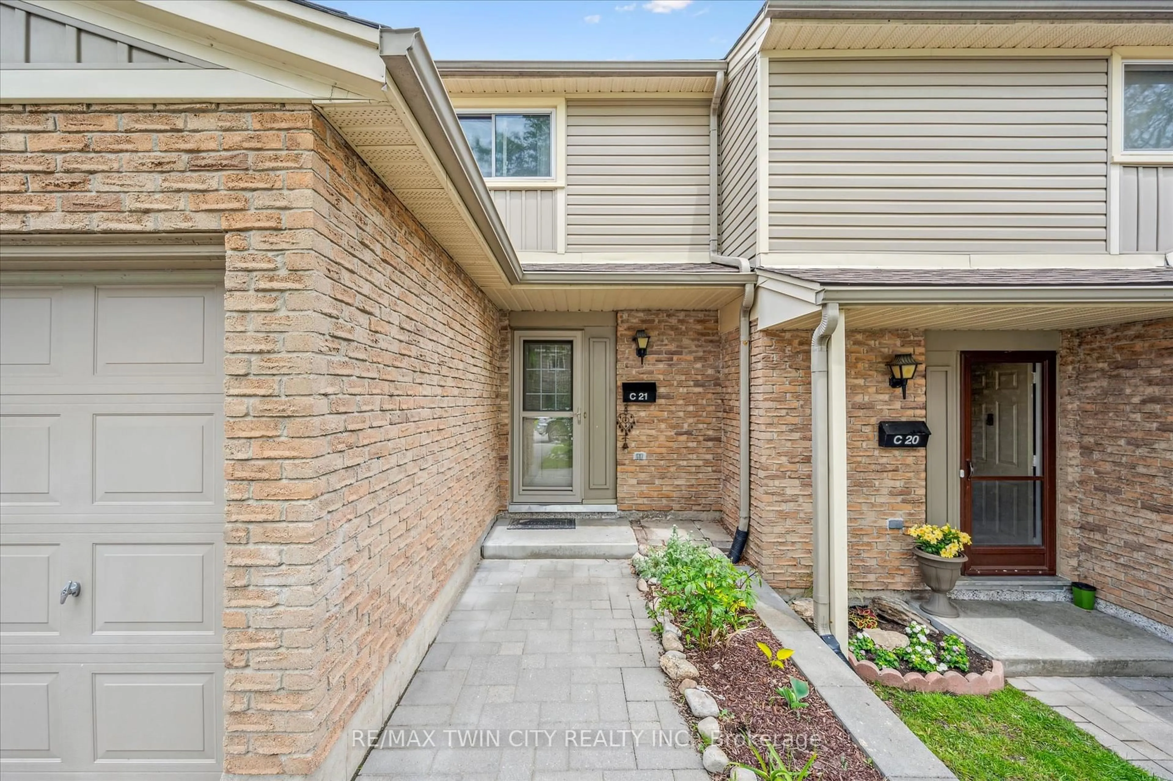 Home with brick exterior material, street for 223 Pioneer Dr, Kitchener Ontario N2P 1L9