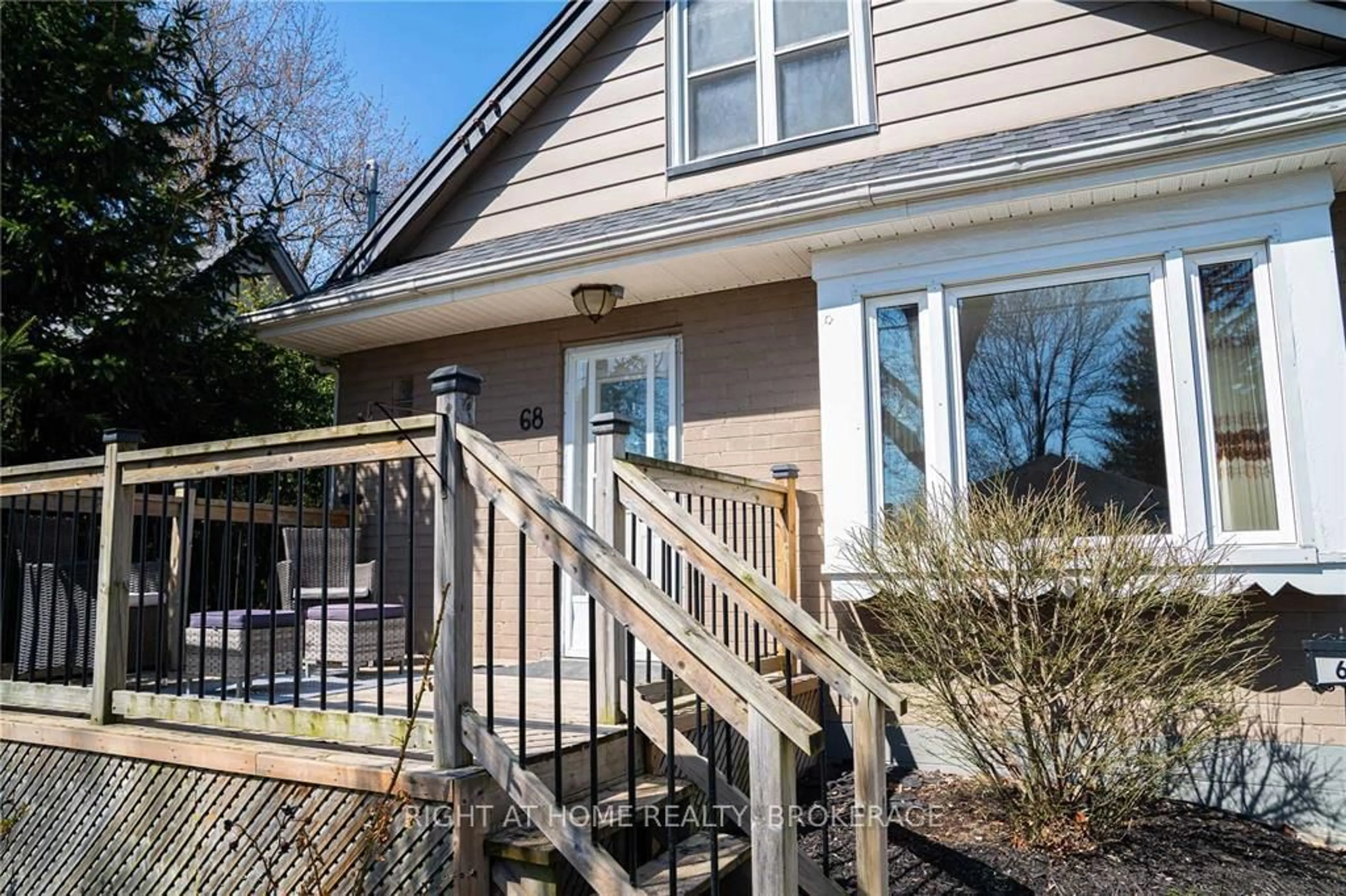Home with vinyl exterior material, street for 68 West 4th St, Hamilton Ontario L9C 3M7