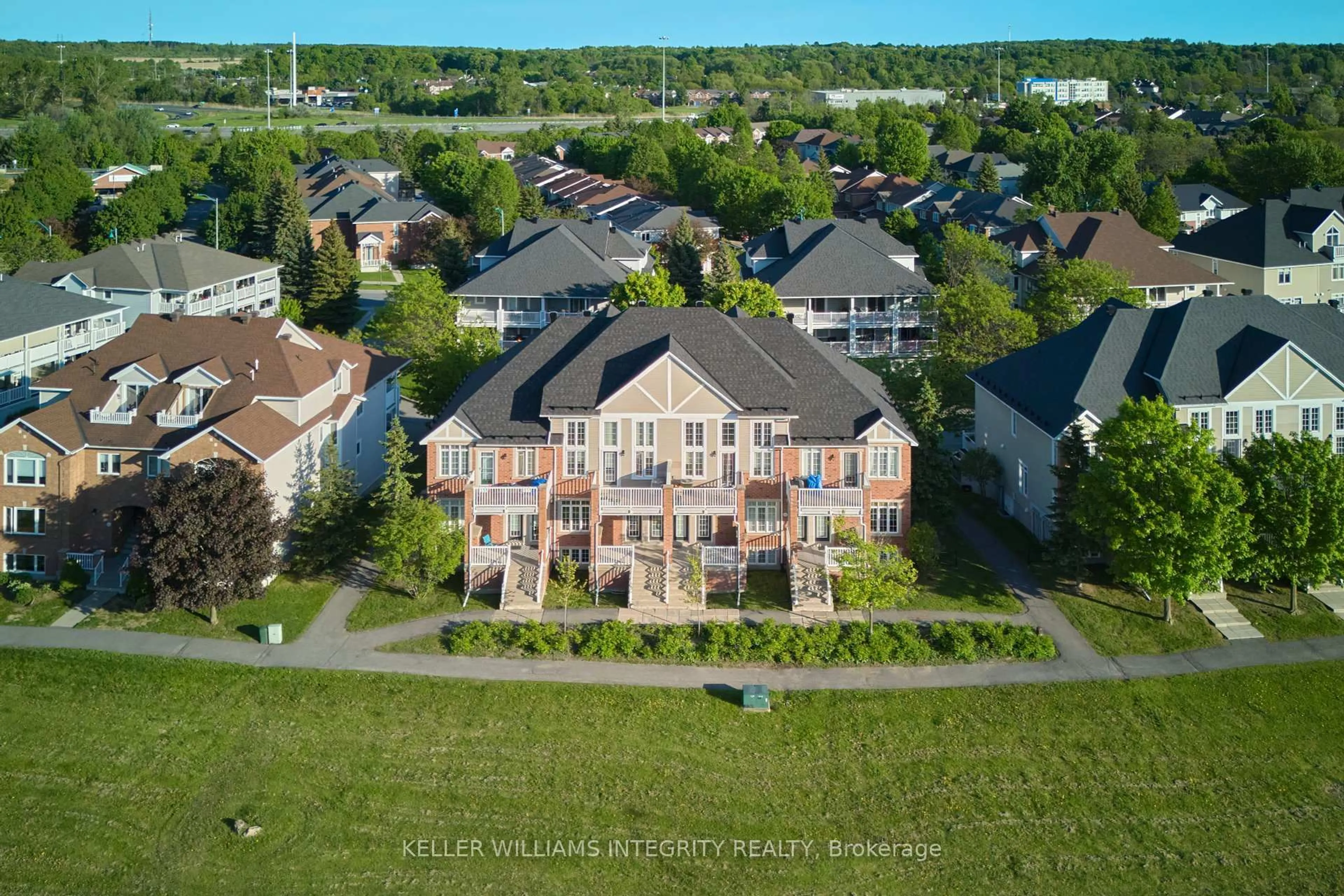 A pic from outside/outdoor area/front of a property/back of a property/a pic from drone, unknown for 1697 Campeau Dr ##3, Ottawa Ontario K2K 0A2
