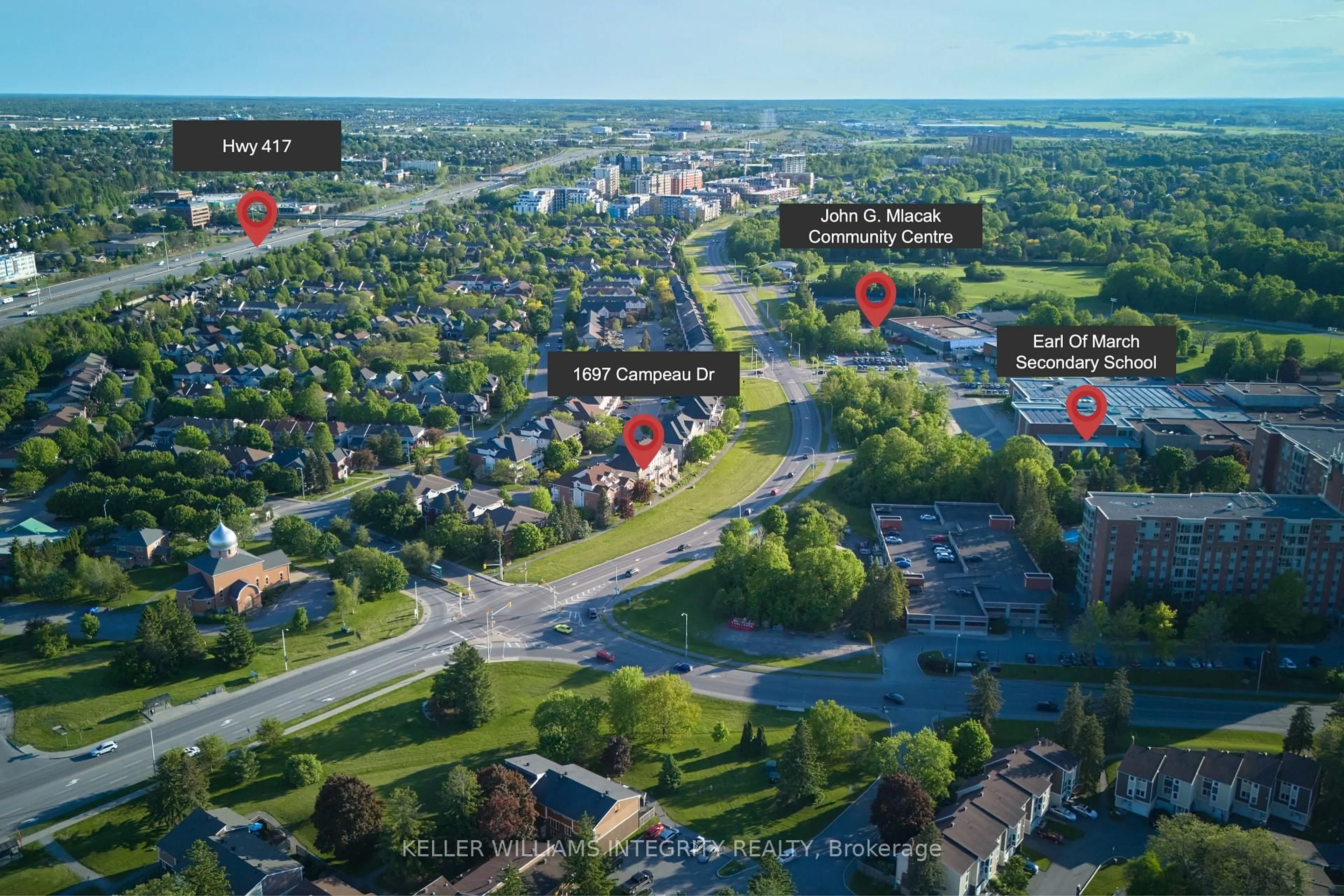 A pic from outside/outdoor area/front of a property/back of a property/a pic from drone, street for 1697 Campeau Dr ##3, Ottawa Ontario K2K 0A2