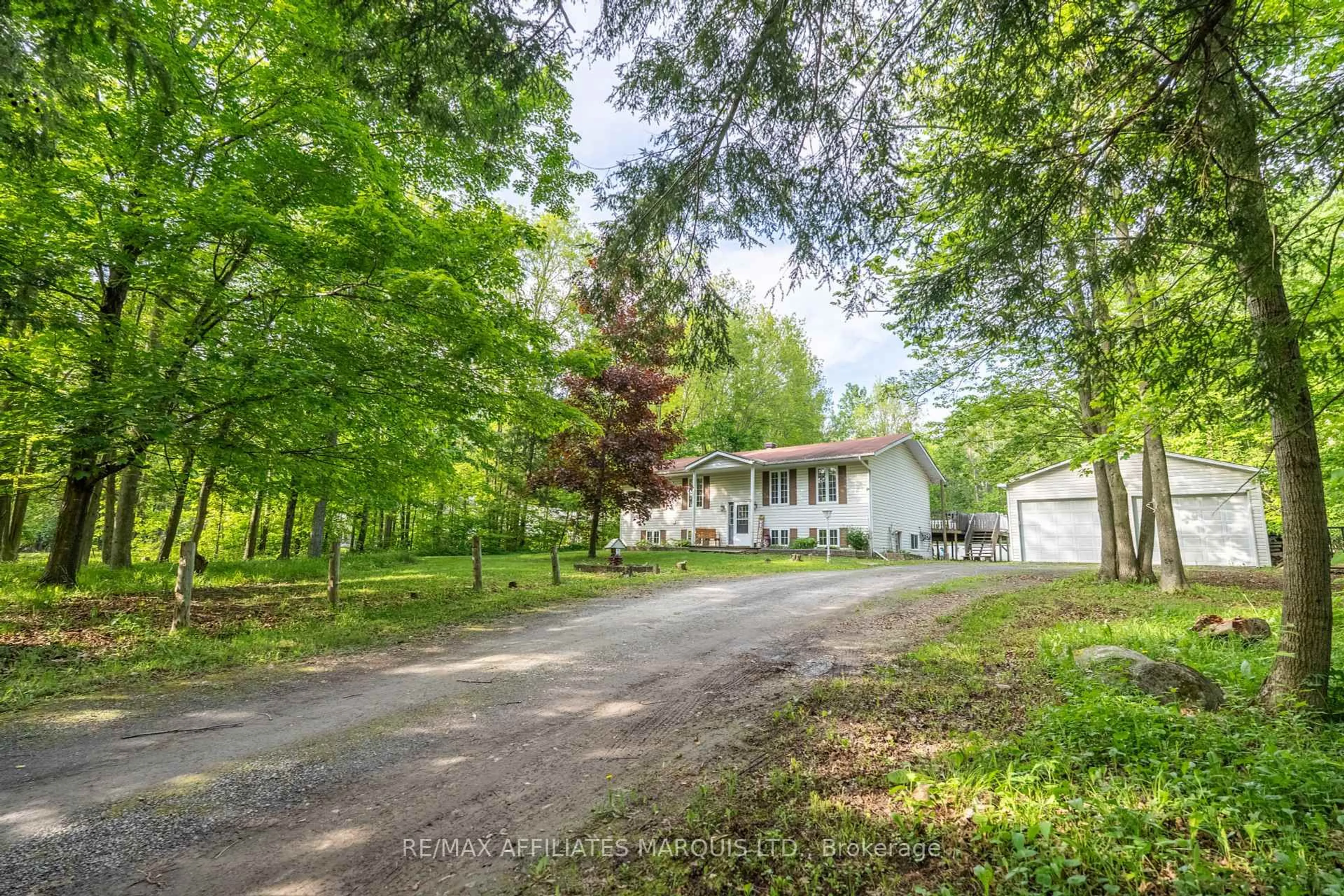 A pic from outside/outdoor area/front of a property/back of a property/a pic from drone, forest/trees view for 5127 Brunet Rd, South Stormont Ontario K0C 1R0
