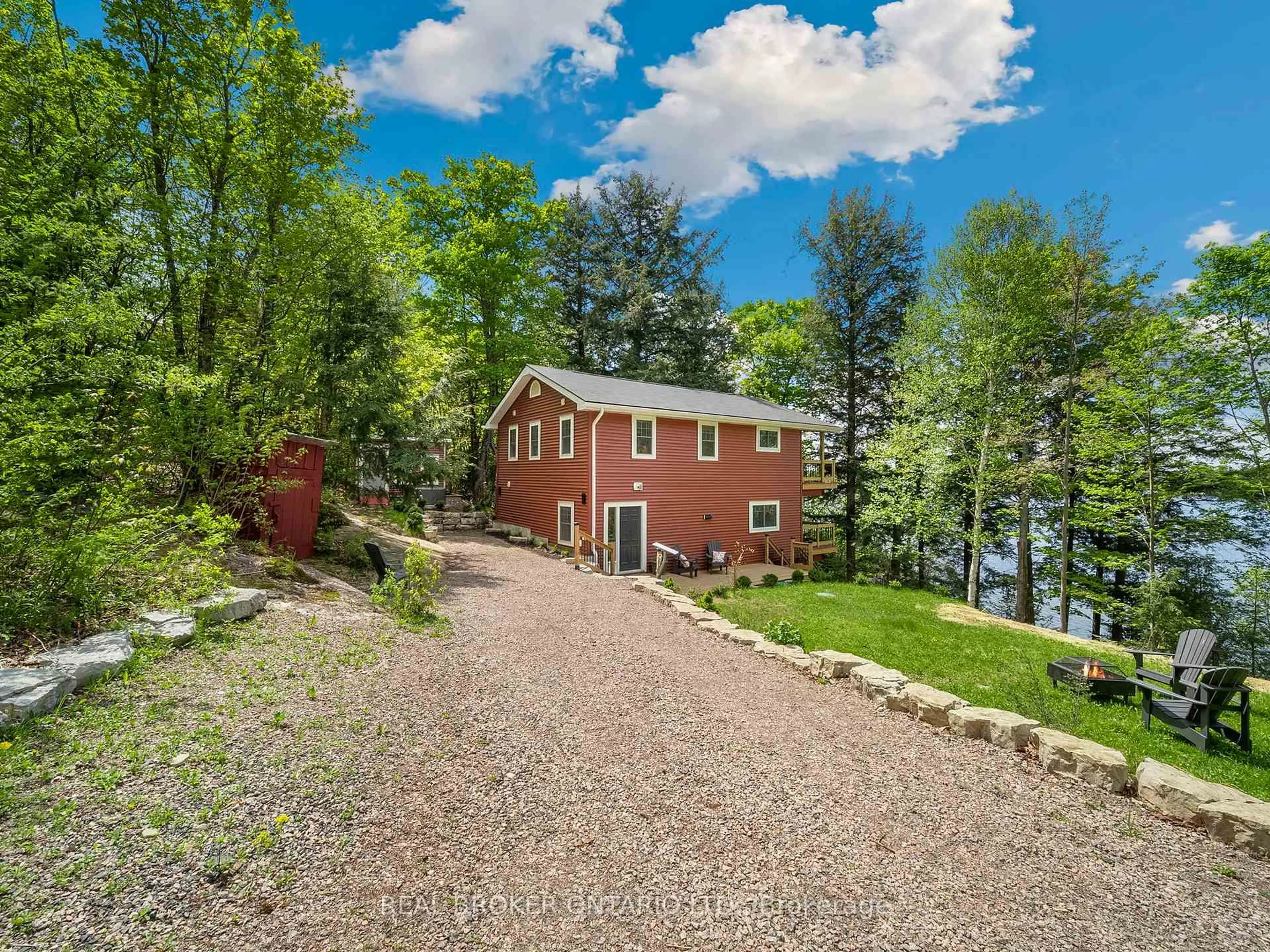 A pic from outside/outdoor area/front of a property/back of a property/a pic from drone, water/lake/river/ocean view for 25 ASH Lane, Magnetawan Ontario P0A 1P0