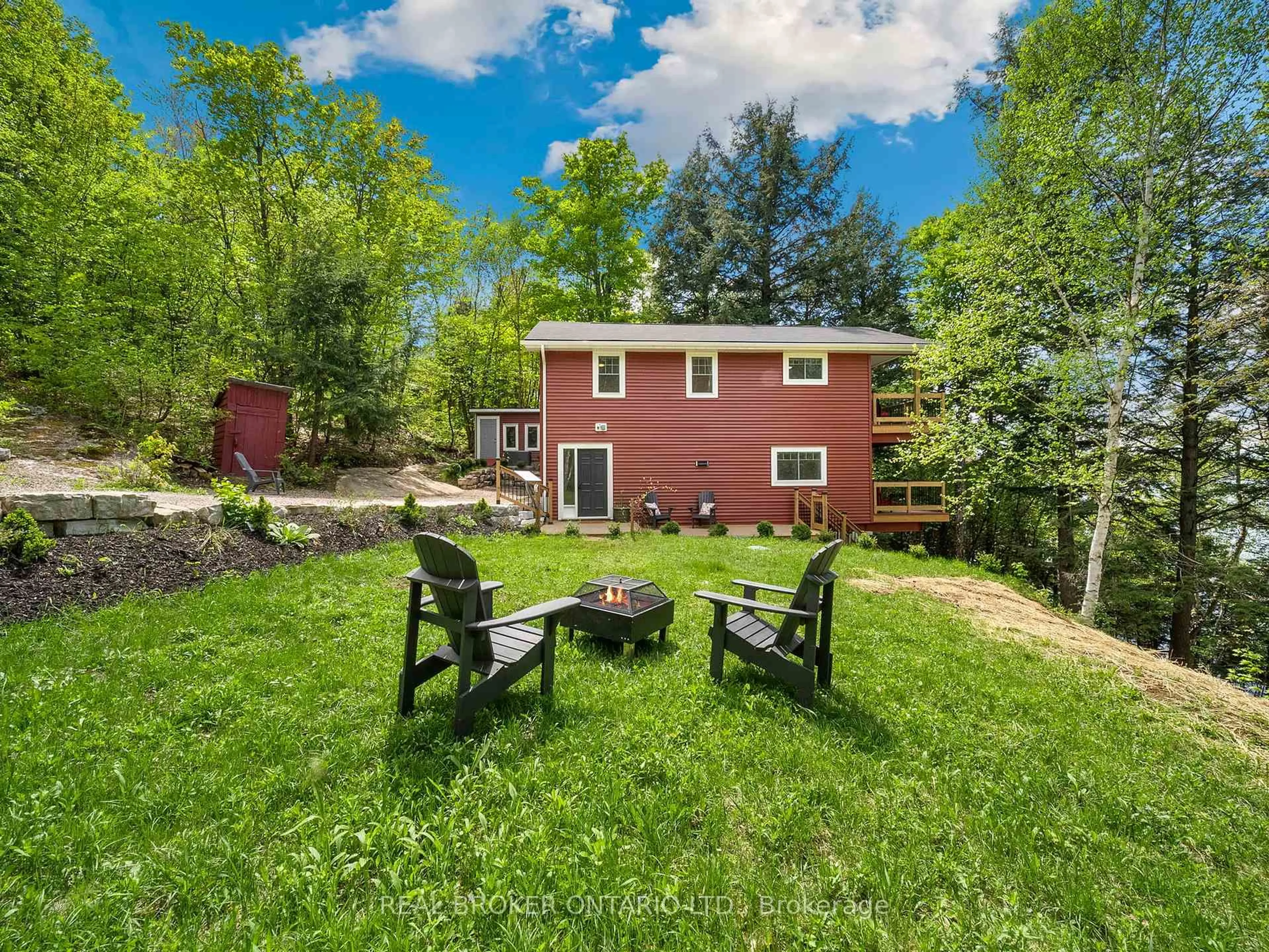 A pic from outside/outdoor area/front of a property/back of a property/a pic from drone, water/lake/river/ocean view for 25 ASH Lane, Magnetawan Ontario P0A 1P0