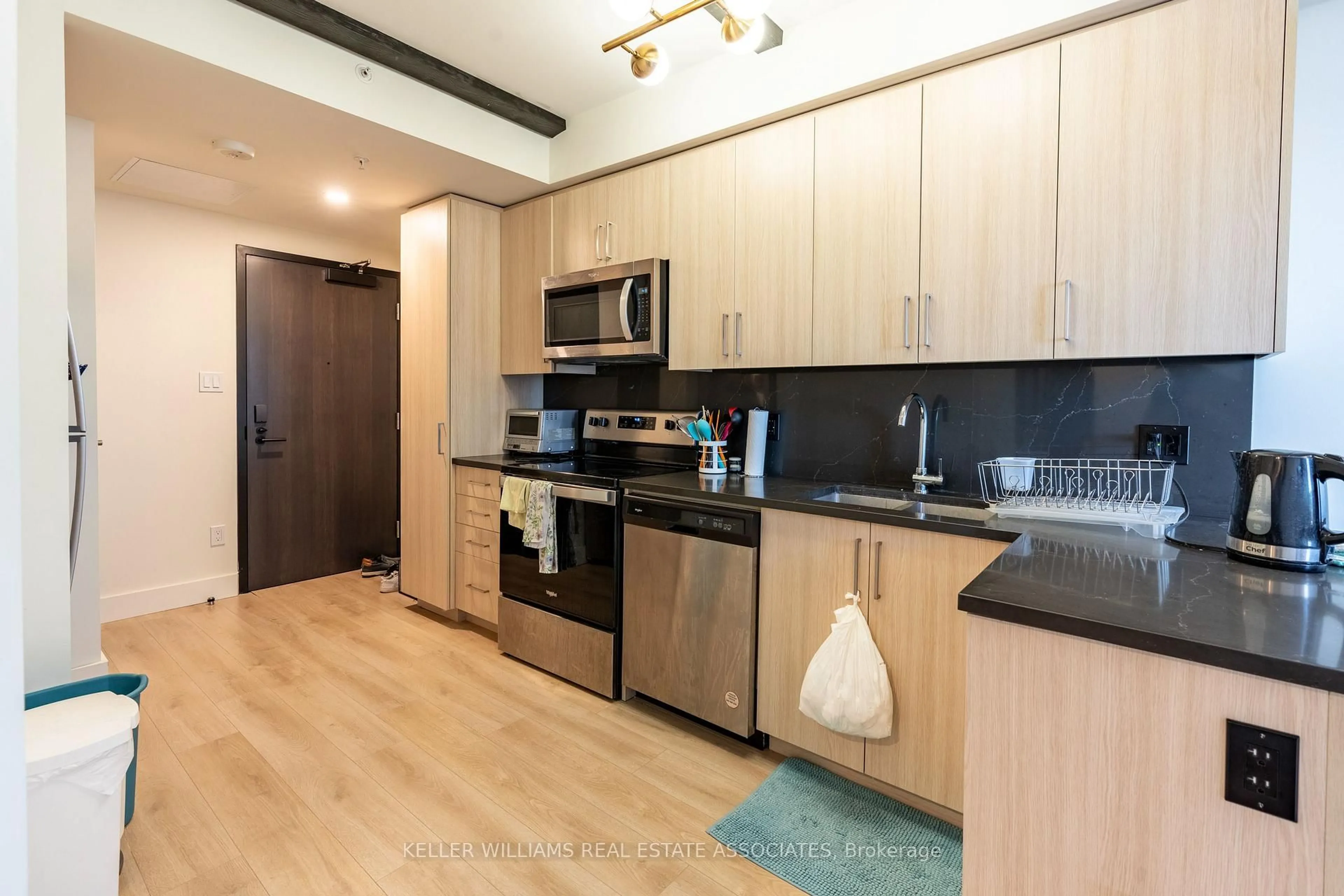 Standard kitchen, wood/laminate floor for 145 Columbia St #514, Waterloo Ontario N2L 0K7