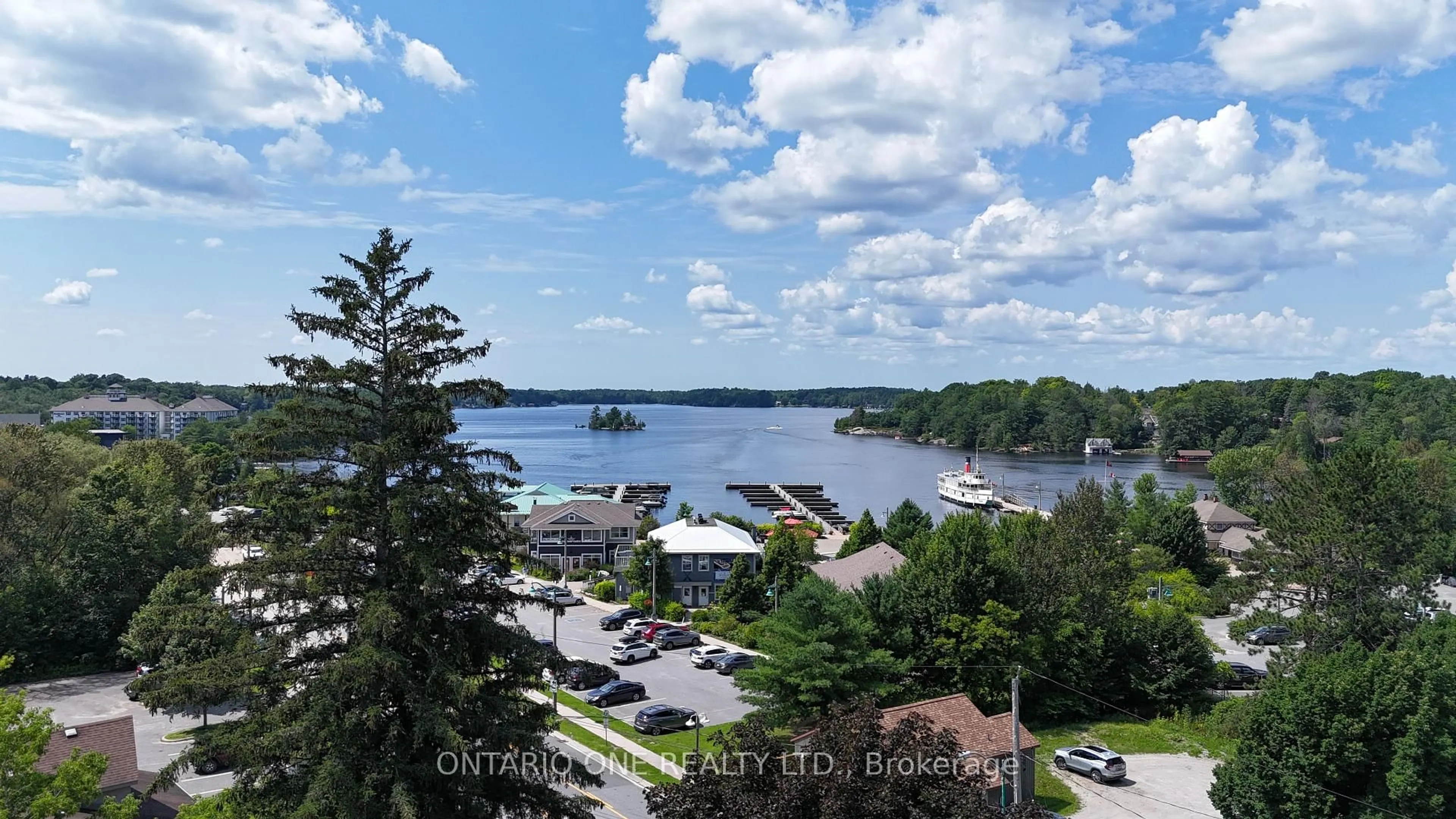 A pic from outside/outdoor area/front of a property/back of a property/a pic from drone, water/lake/river/ocean view for 811 BAY St, Gravenhurst Ontario P1P 1G7