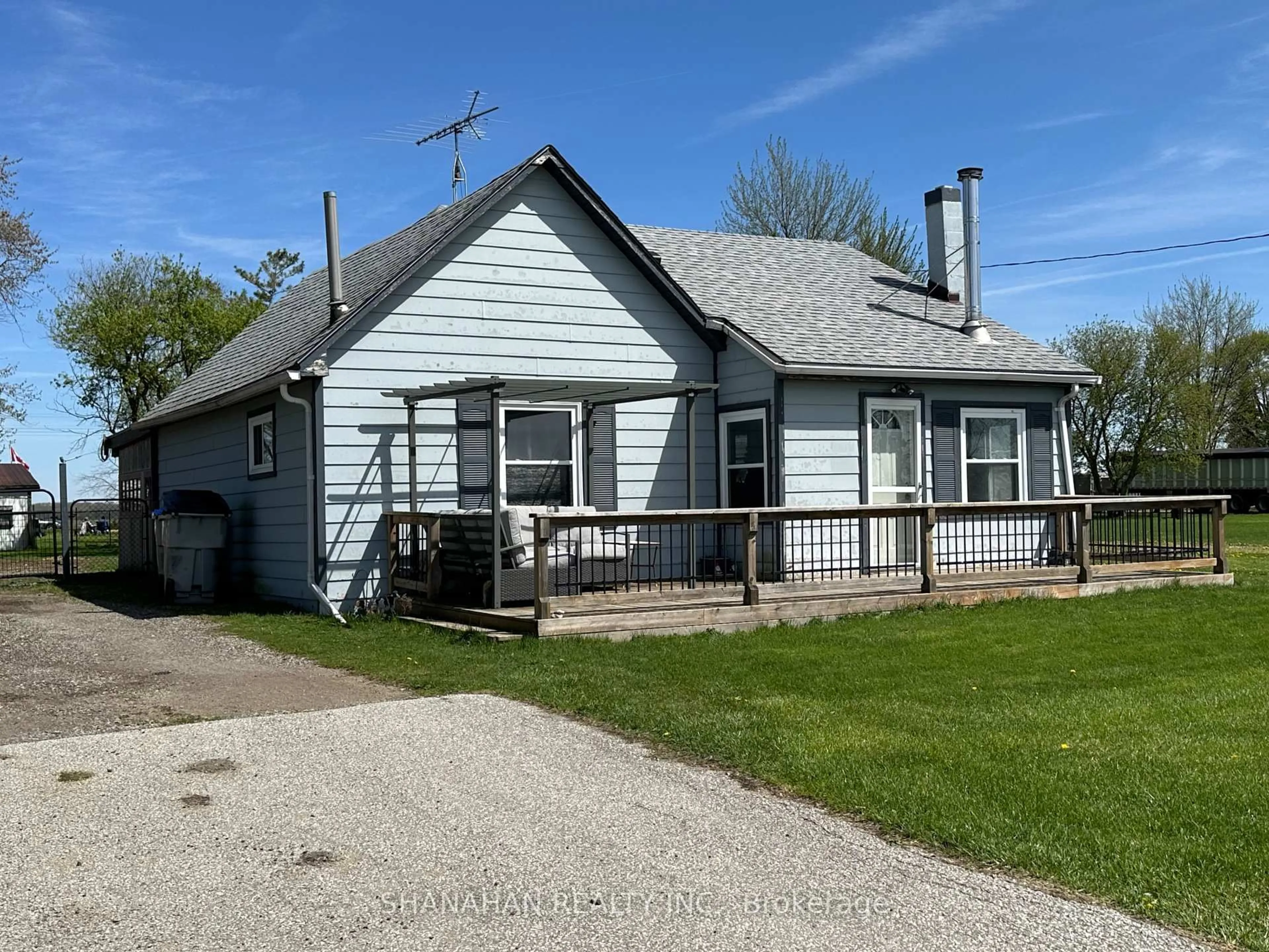 A pic from outside/outdoor area/front of a property/back of a property/a pic from drone, street for 3158 Queen St, Brooke-Alvinston Ontario N0N 1K0