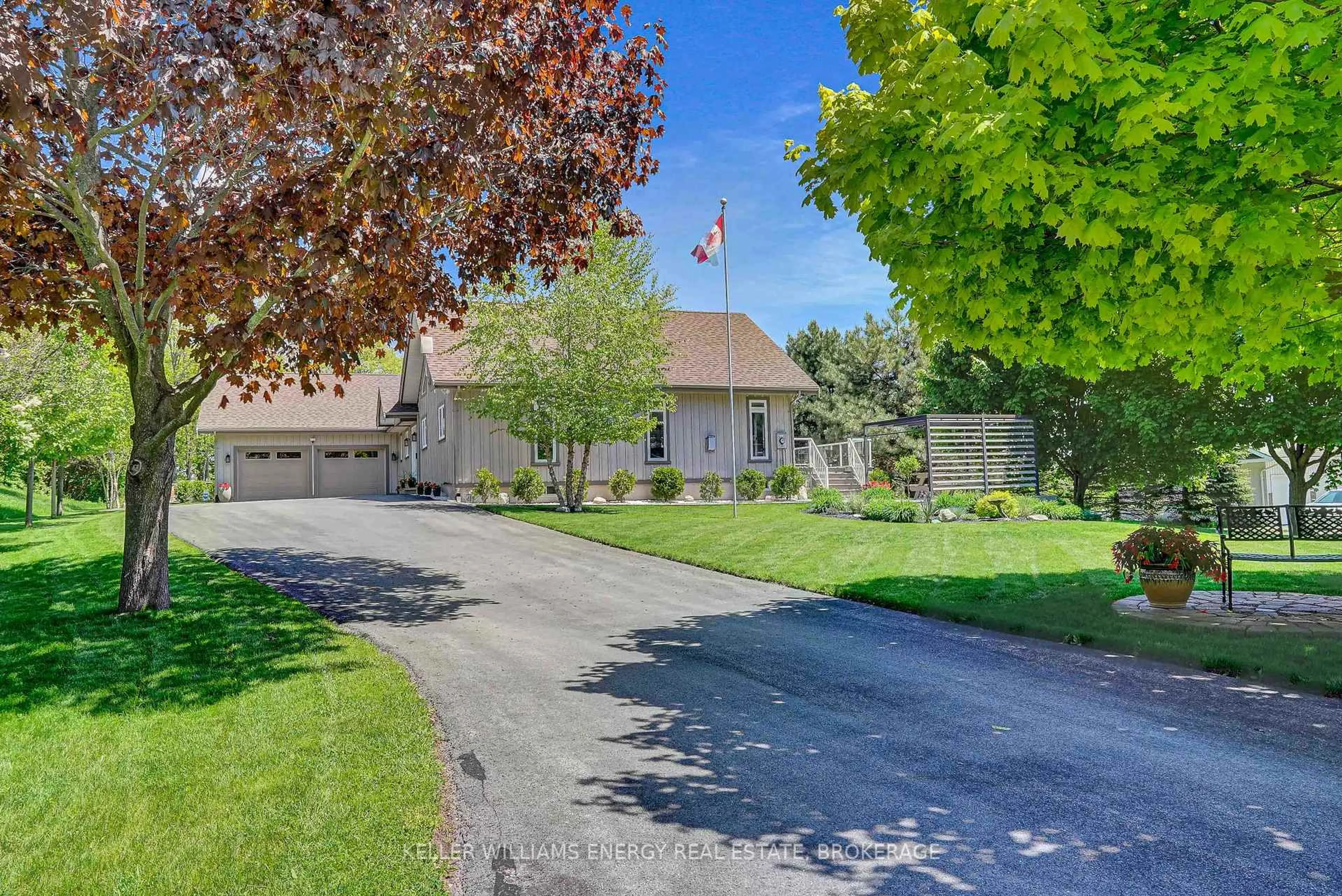 A pic from outside/outdoor area/front of a property/back of a property/a pic from drone, street for 43 Smiths Bay Ave, Prince Edward County Ontario K0K 2T0