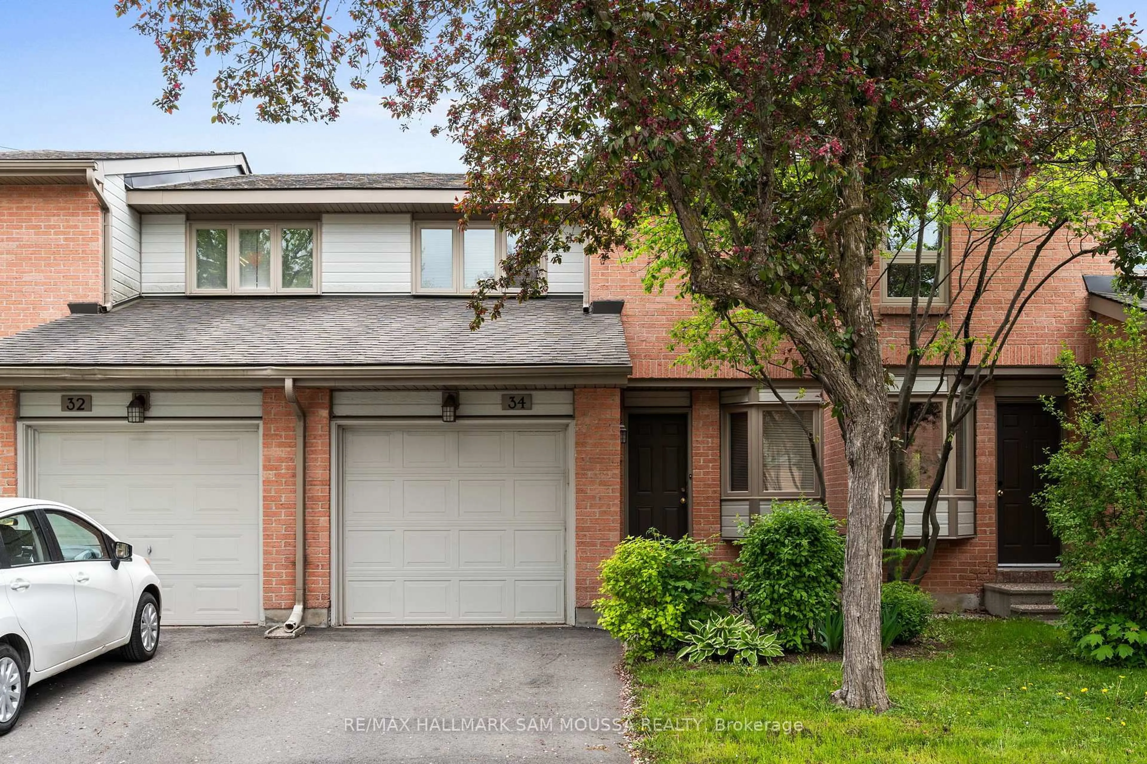 Home with brick exterior material, street for 710 Coronation Ave #34, Ottawa Ontario K1G 4G7