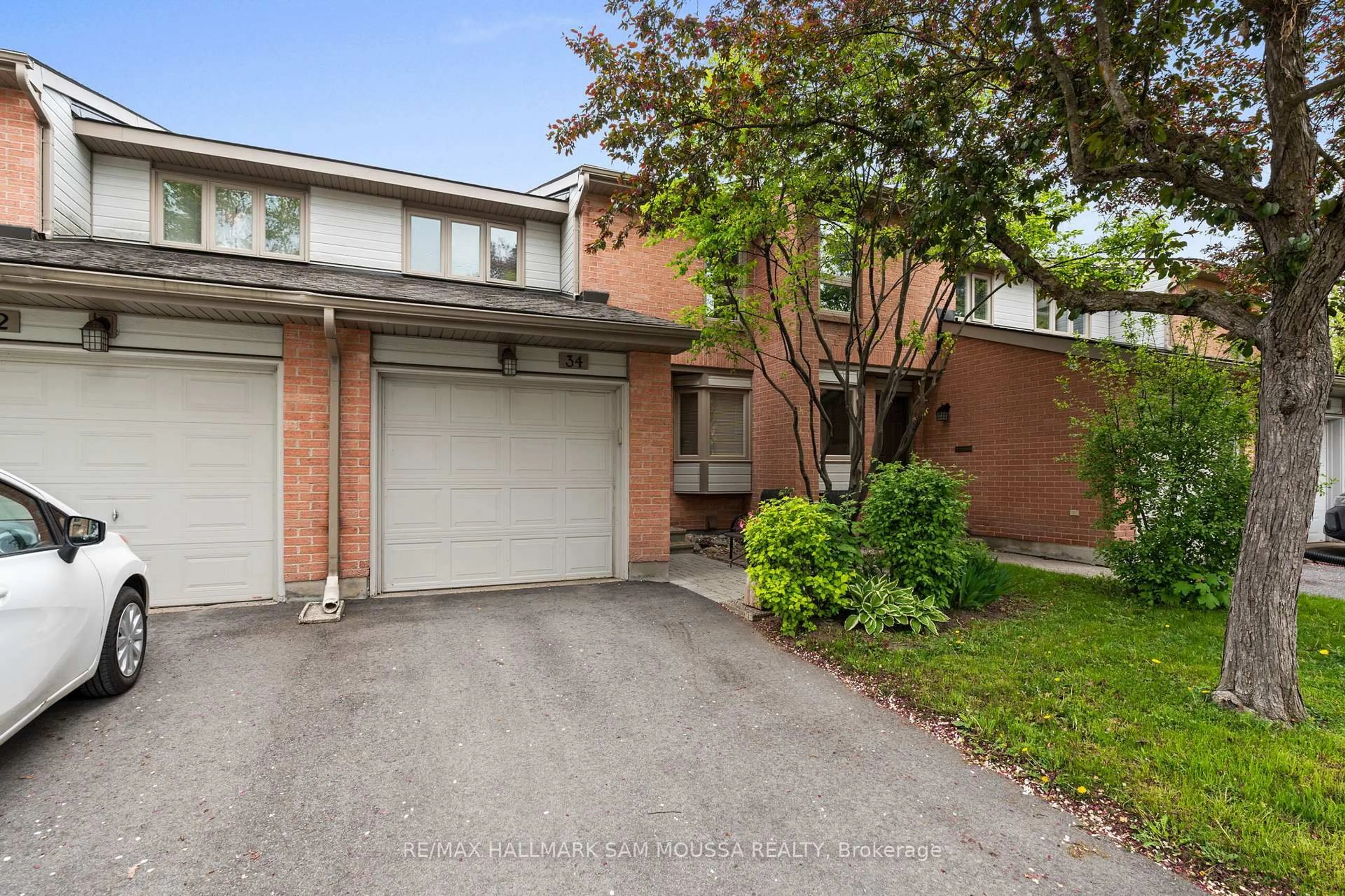 Home with brick exterior material, street for 710 Coronation Ave #34, Ottawa Ontario K1G 4G7