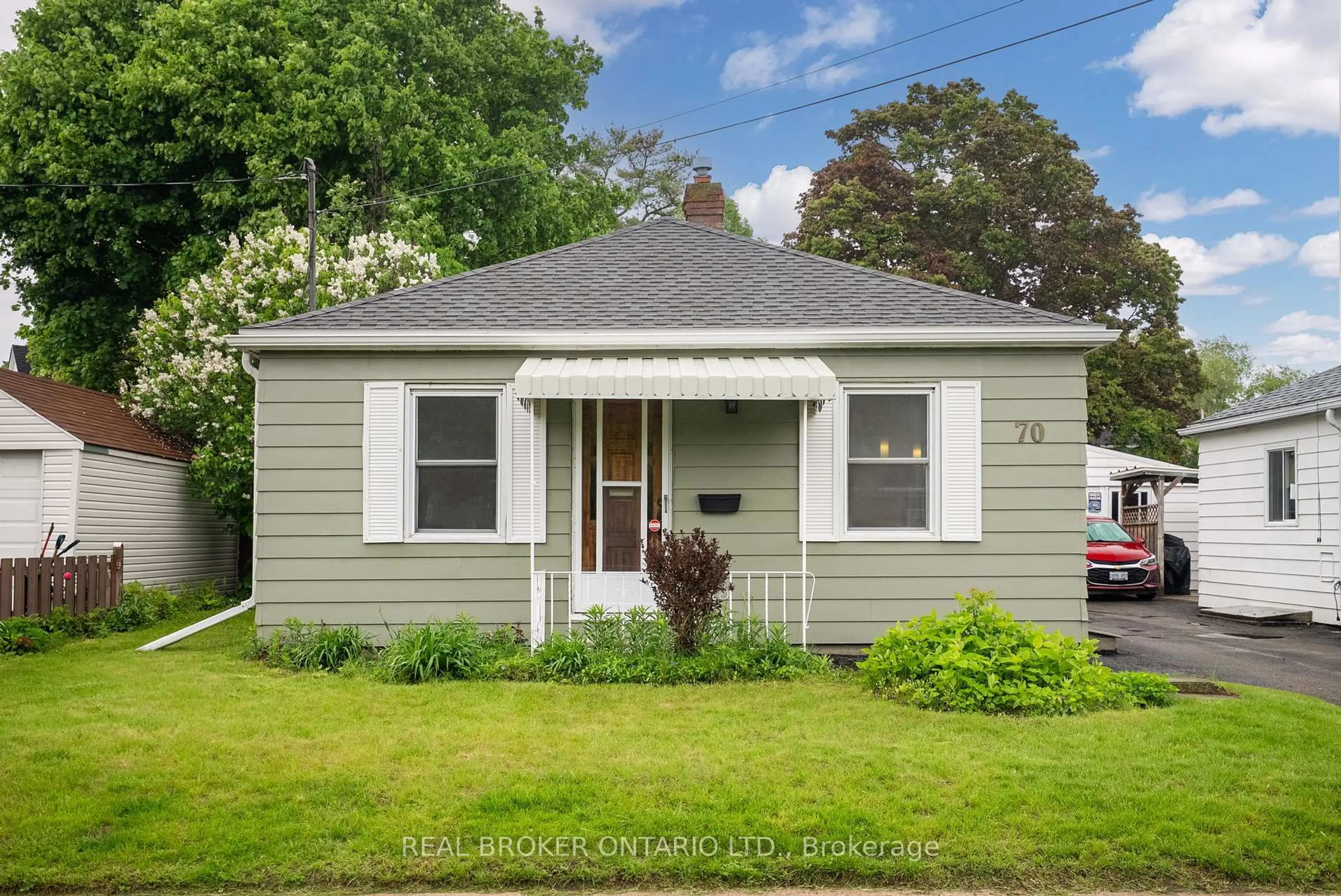 Home with vinyl exterior material, street for 70 Chislett St, Brockville Ontario K6V 4L1