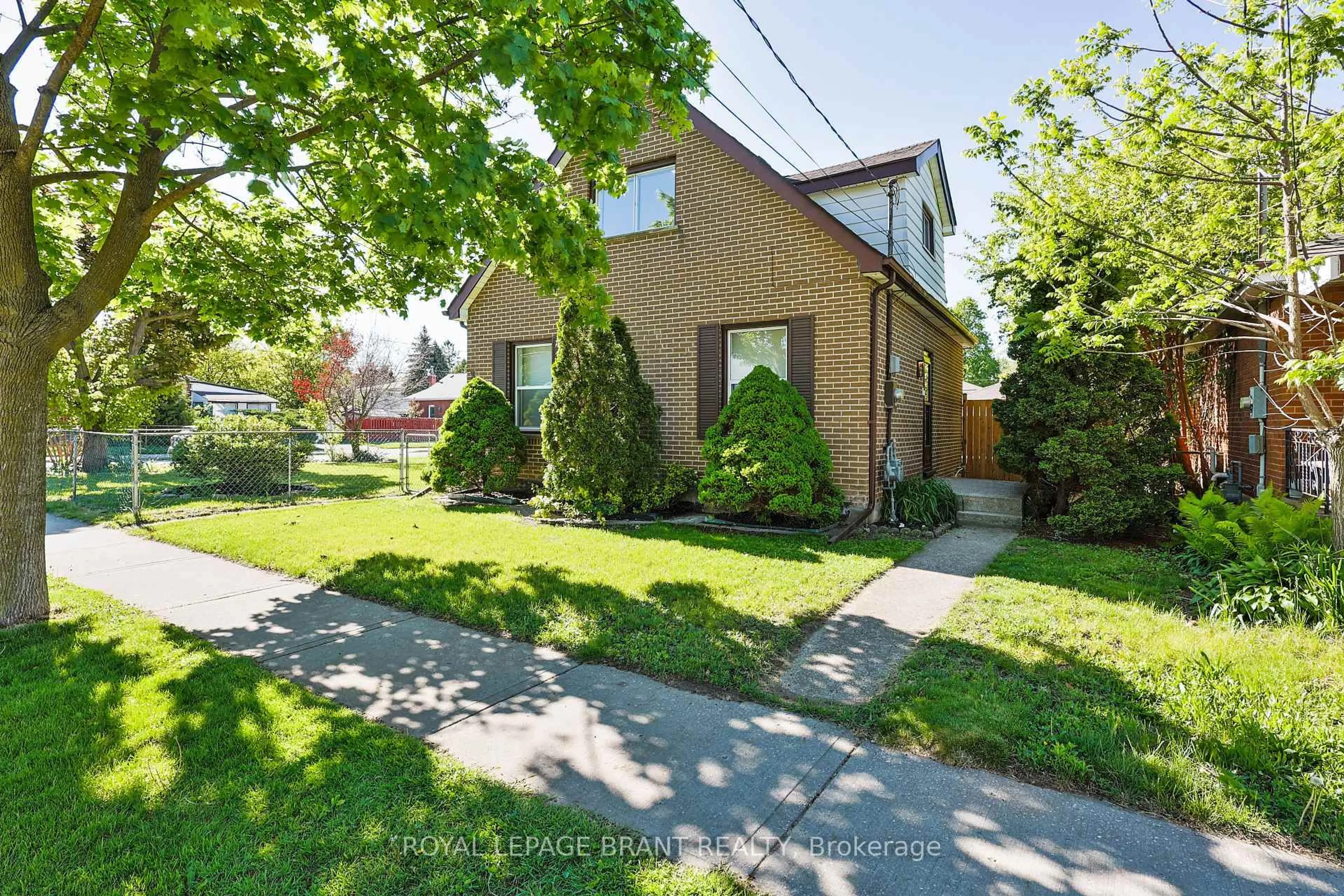 Home with brick exterior material, street for 311 Sheridan St, Brantford Ontario N3S 4R5