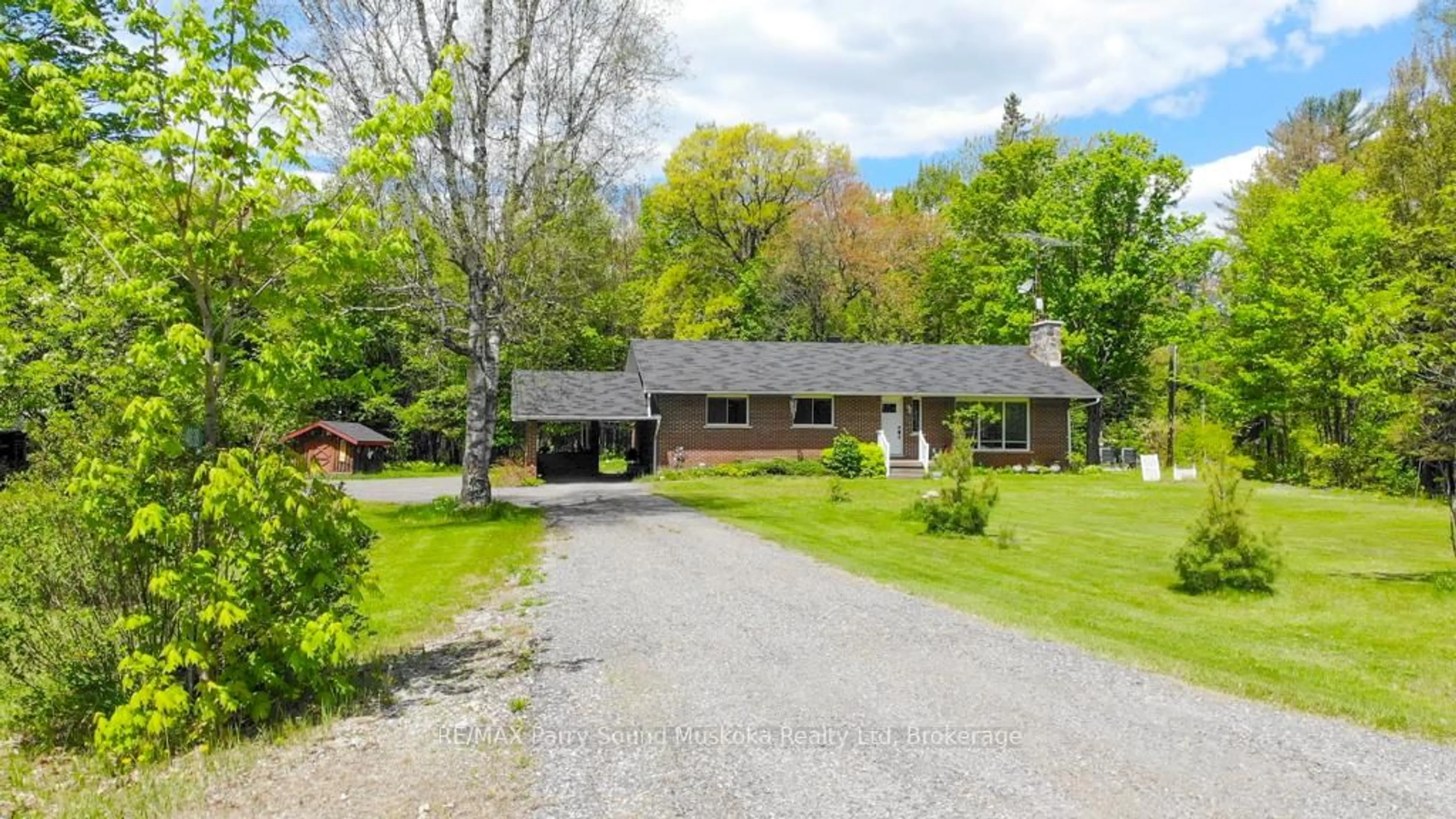 A pic from outside/outdoor area/front of a property/back of a property/a pic from drone, street for 4838 124 Highway, Magnetawan Ontario P0A 1P0