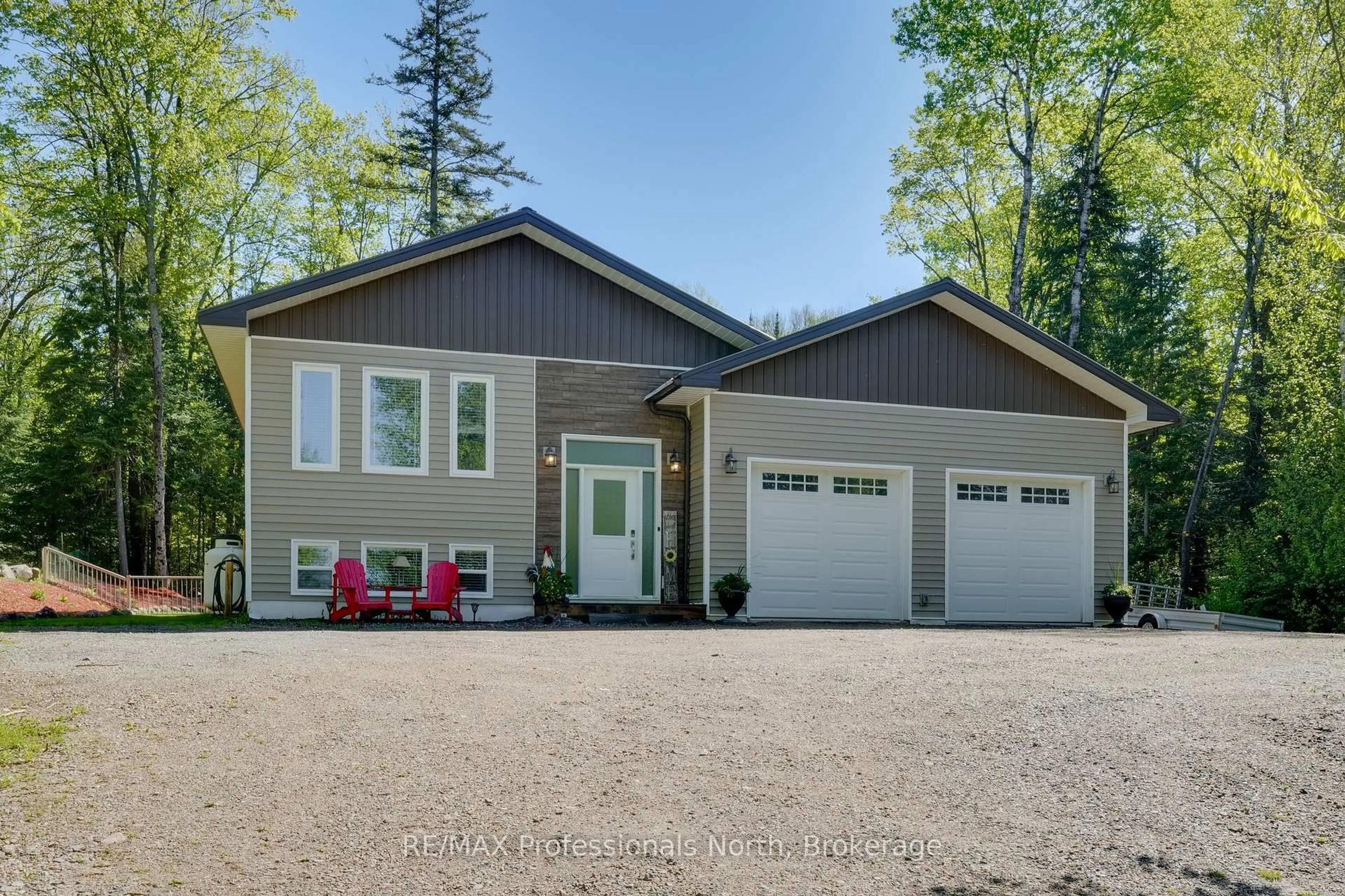 Home with vinyl exterior material, street for 311 STATION Rd, Perry Ontario P0A 1J0