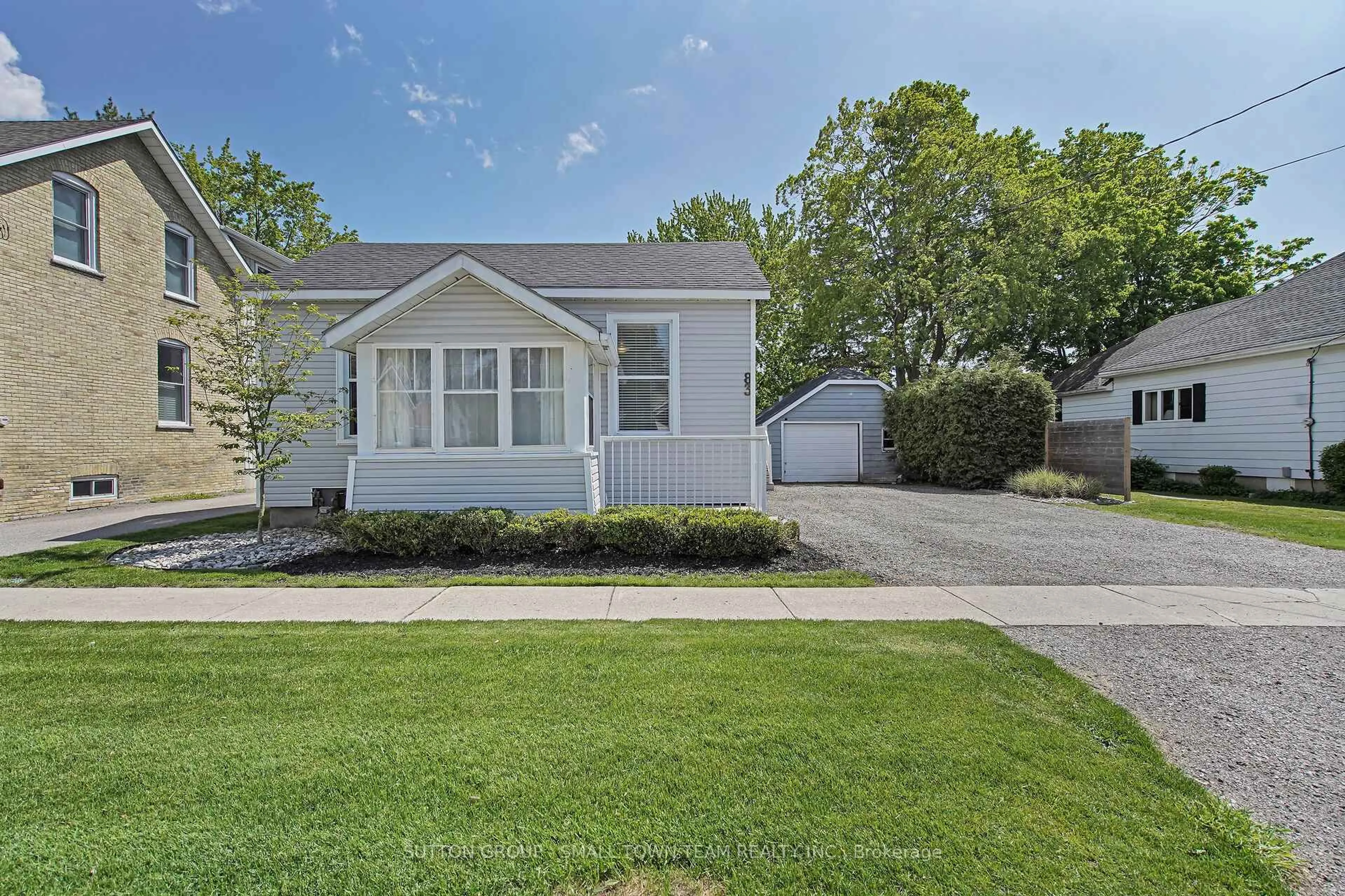 Home with vinyl exterior material, street for 83 John St, South Huron Ontario N0M 1S1