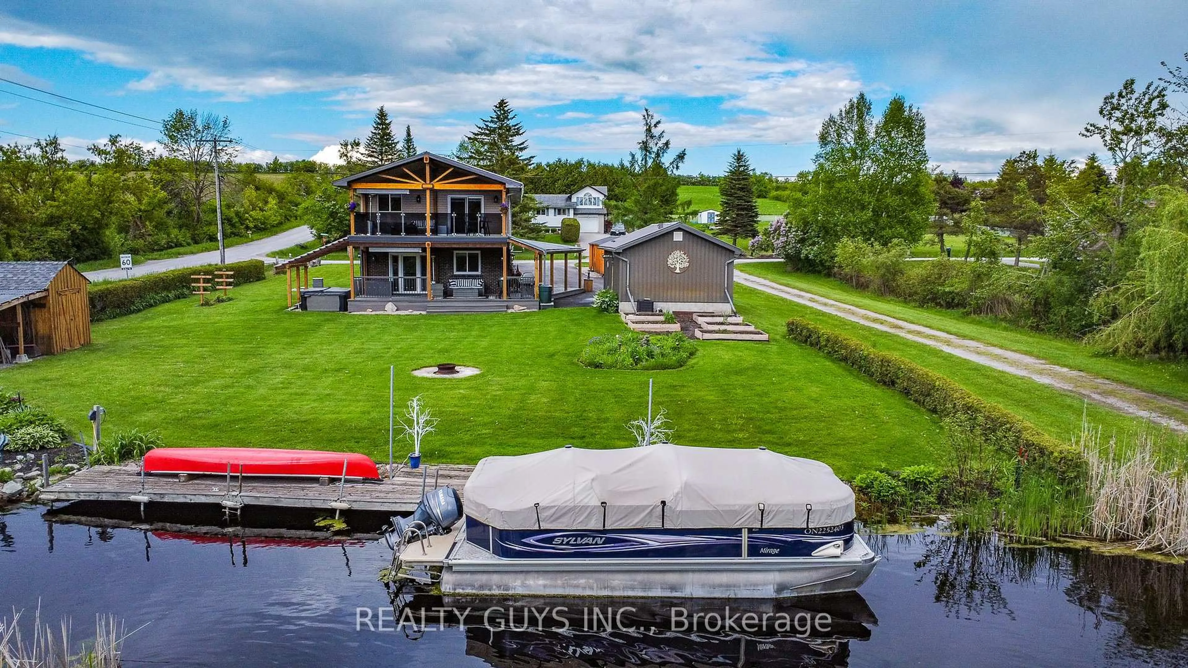 A pic from outside/outdoor area/front of a property/back of a property/a pic from drone, water/lake/river/ocean view for 4 Cadillac Blvd, Kawartha Lakes Ontario K0L 2W0