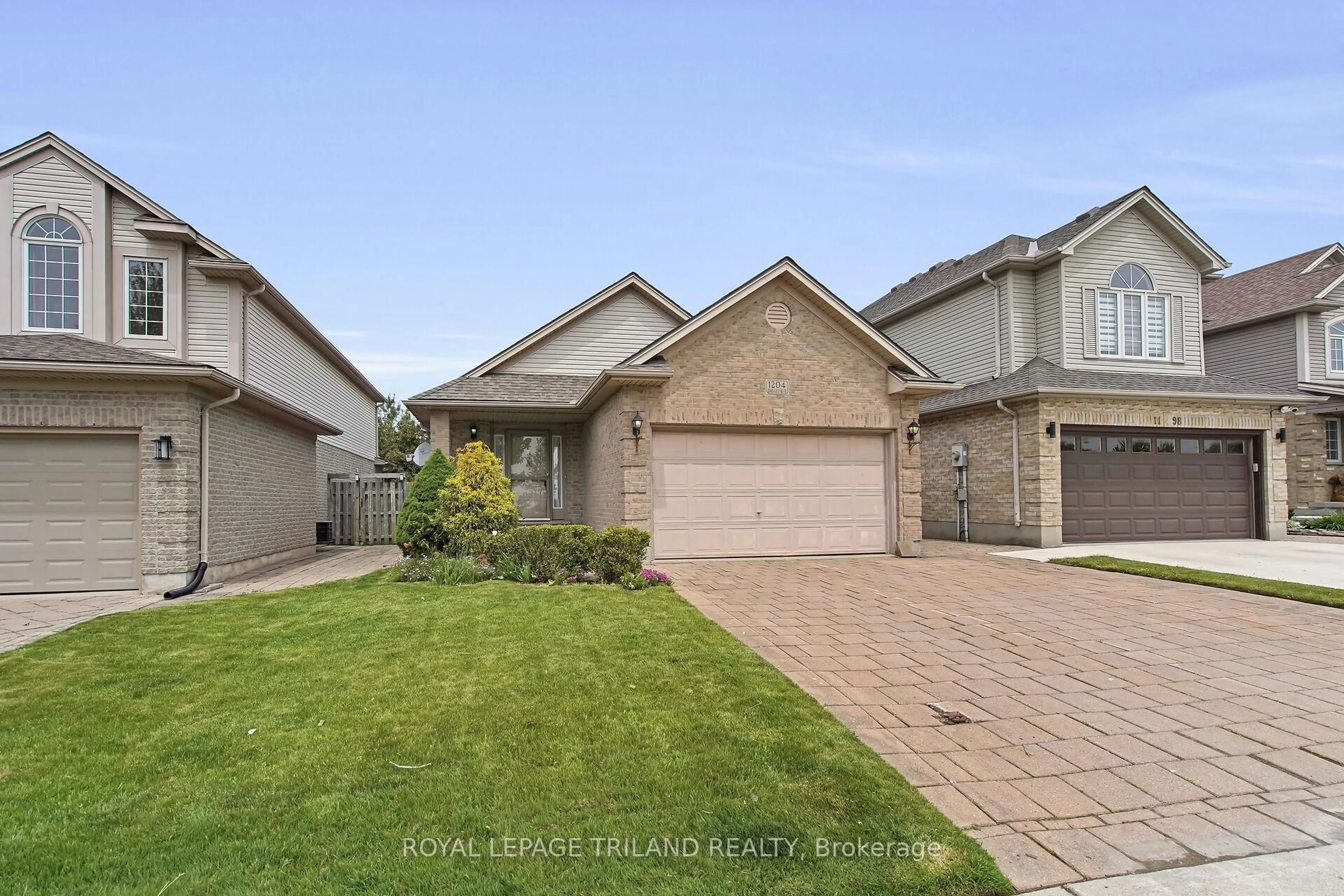 Home with brick exterior material, street for 1204 Darnley Blvd, London South Ontario N6M 1J4