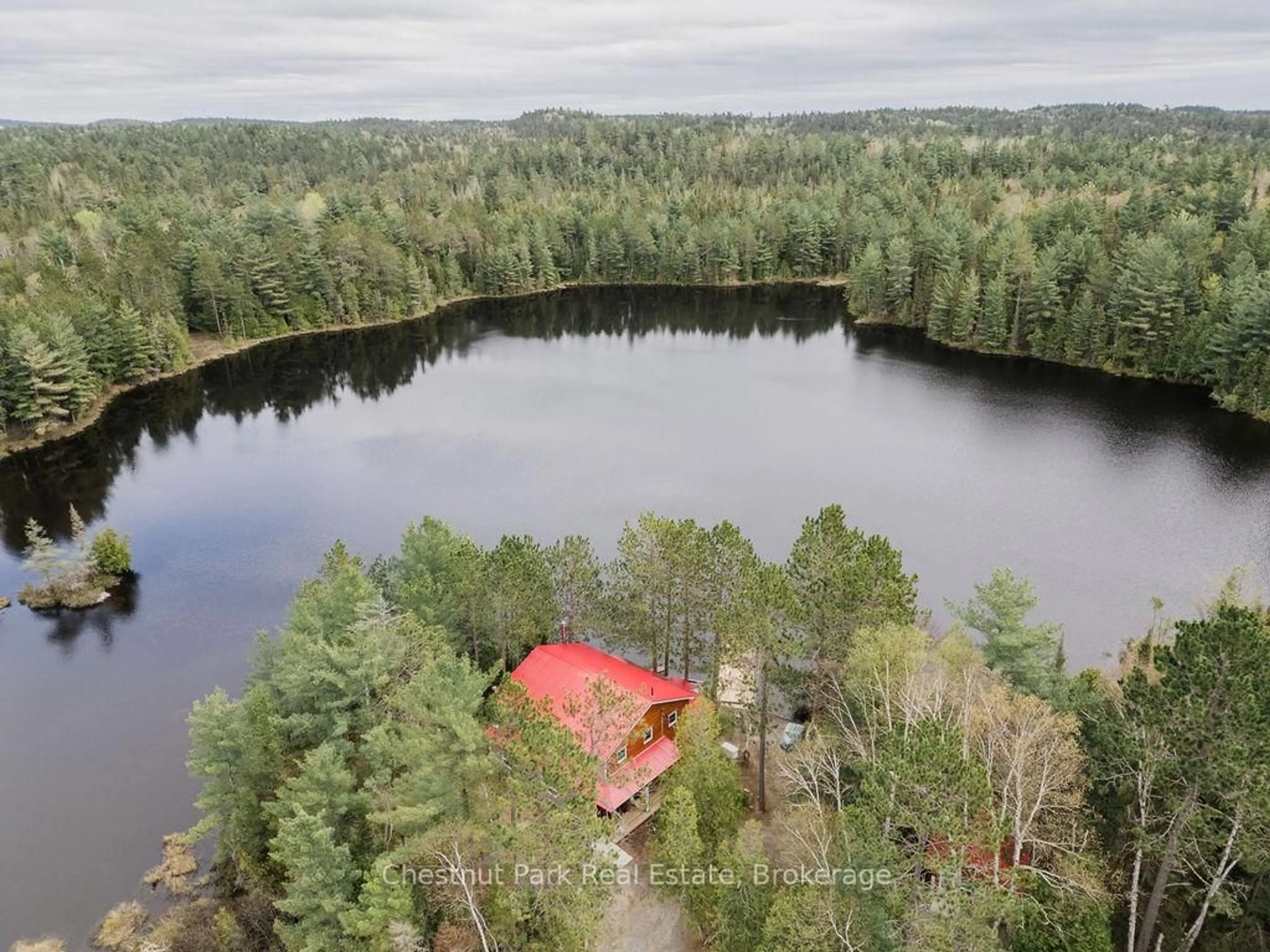 A pic from outside/outdoor area/front of a property/back of a property/a pic from drone, water/lake/river/ocean view for 6131 Highway 11 Highway, Temagami Ontario P0H 2H0