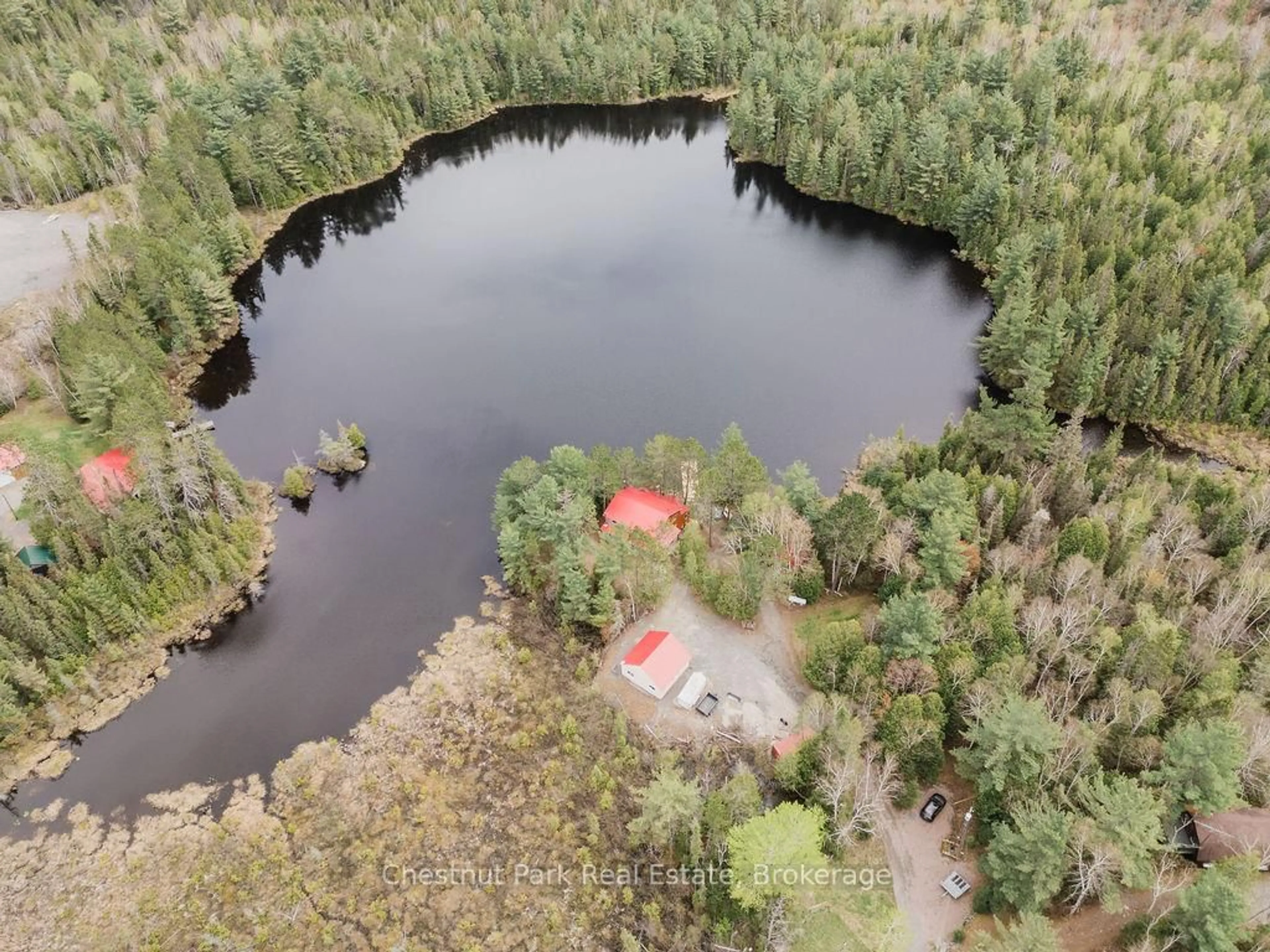 A pic from outside/outdoor area/front of a property/back of a property/a pic from drone, water/lake/river/ocean view for 6131 Highway 11 Highway, Temagami Ontario P0H 2H0