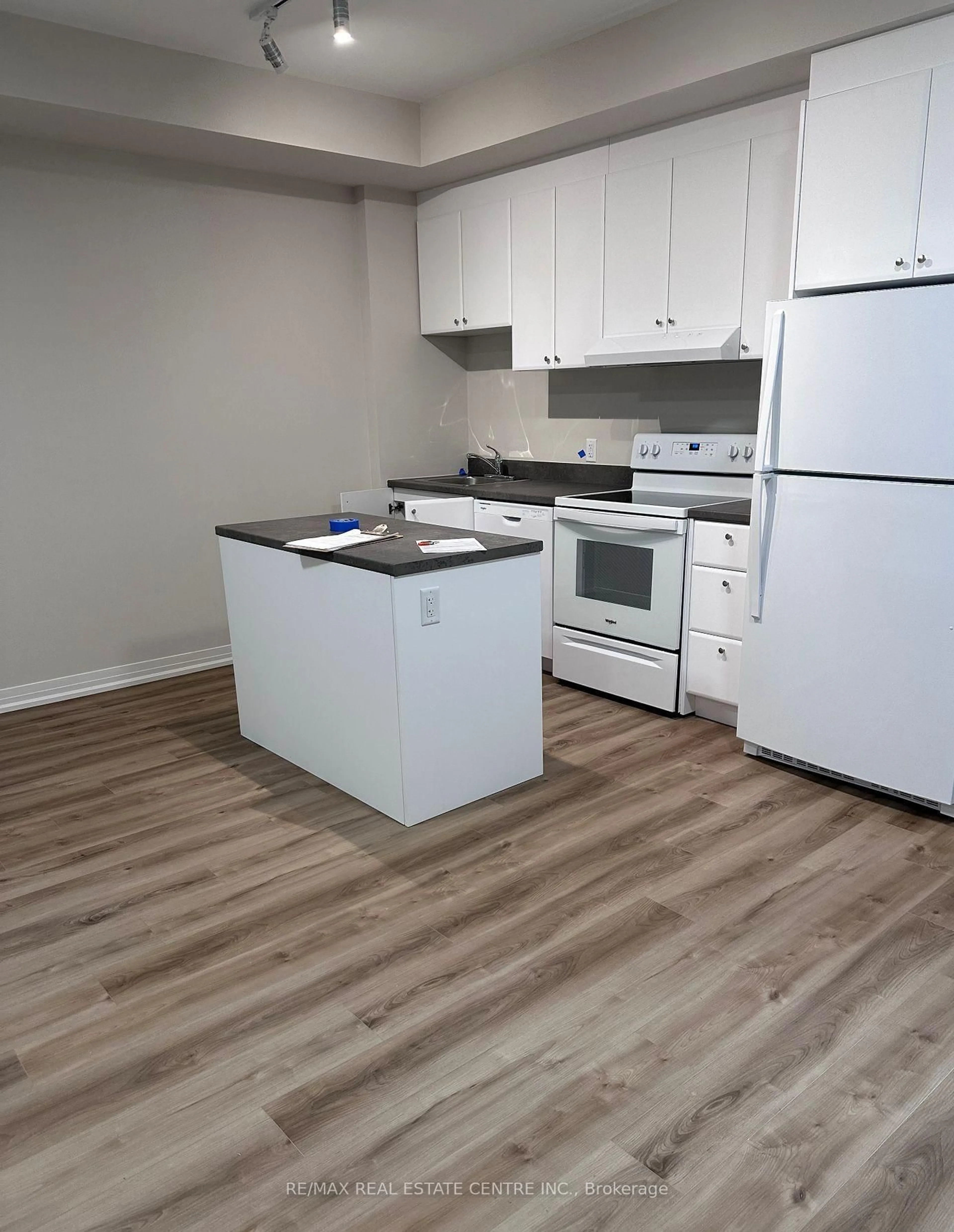 Standard kitchen, wood/laminate floor for 50 Herrick Ave #LP08, St. Catharines Ontario L2P 2T9