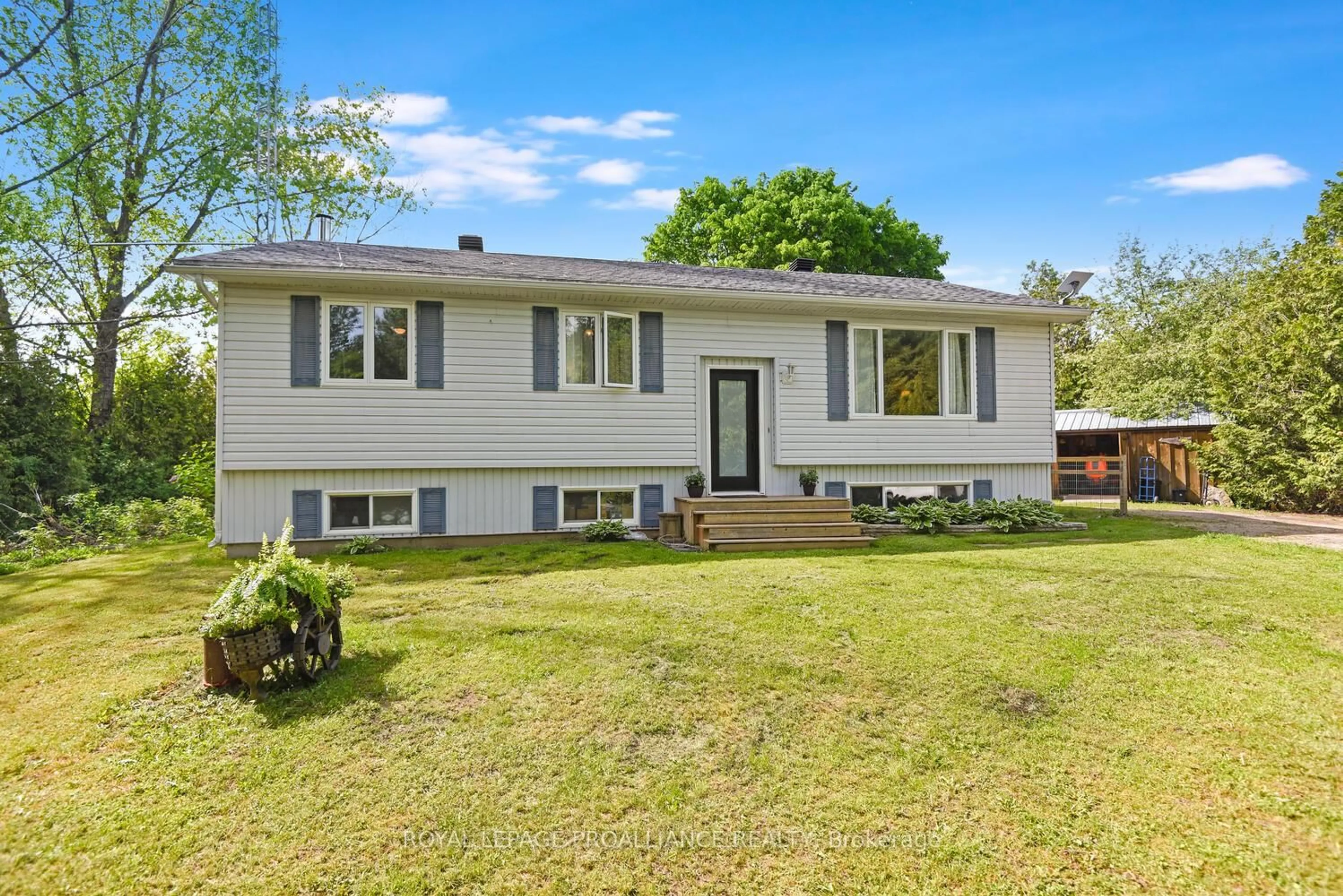Home with vinyl exterior material, street for 46 Graham Lake Rd, Front of Yonge Ontario K0E 1R0