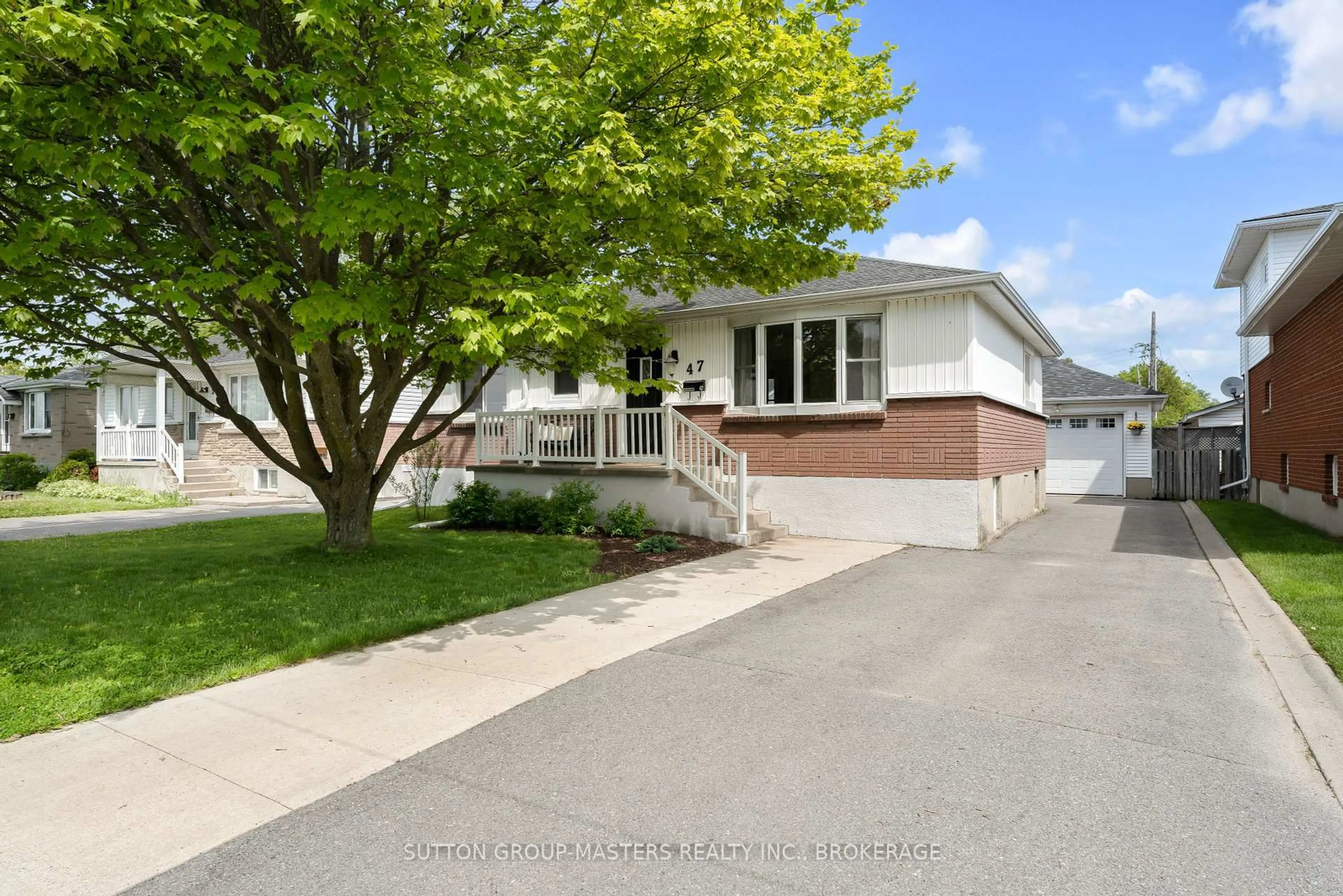 Home with vinyl exterior material, street for 47 Oak St, Kingston Ontario K7K 2N1