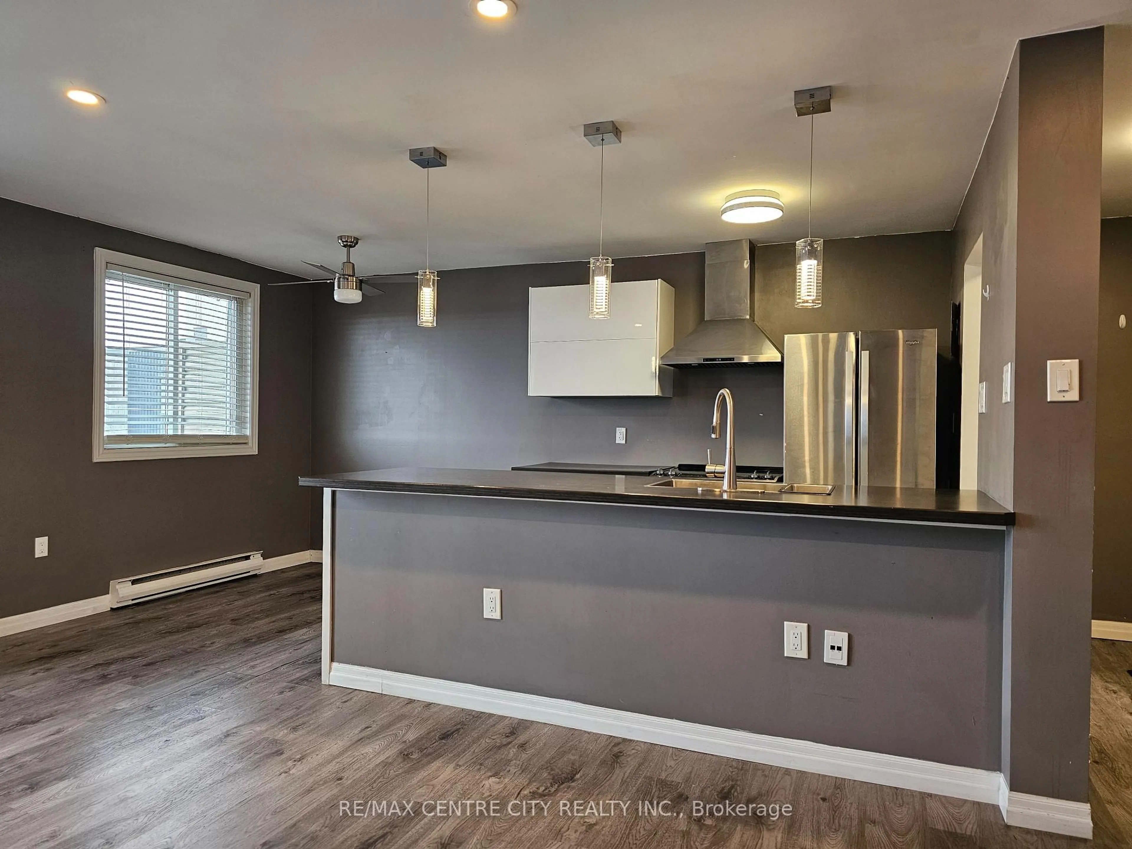 Open concept kitchen, wood/laminate floor for 1102 Jalna Blvd #601, London South Ontario N6E 1X8