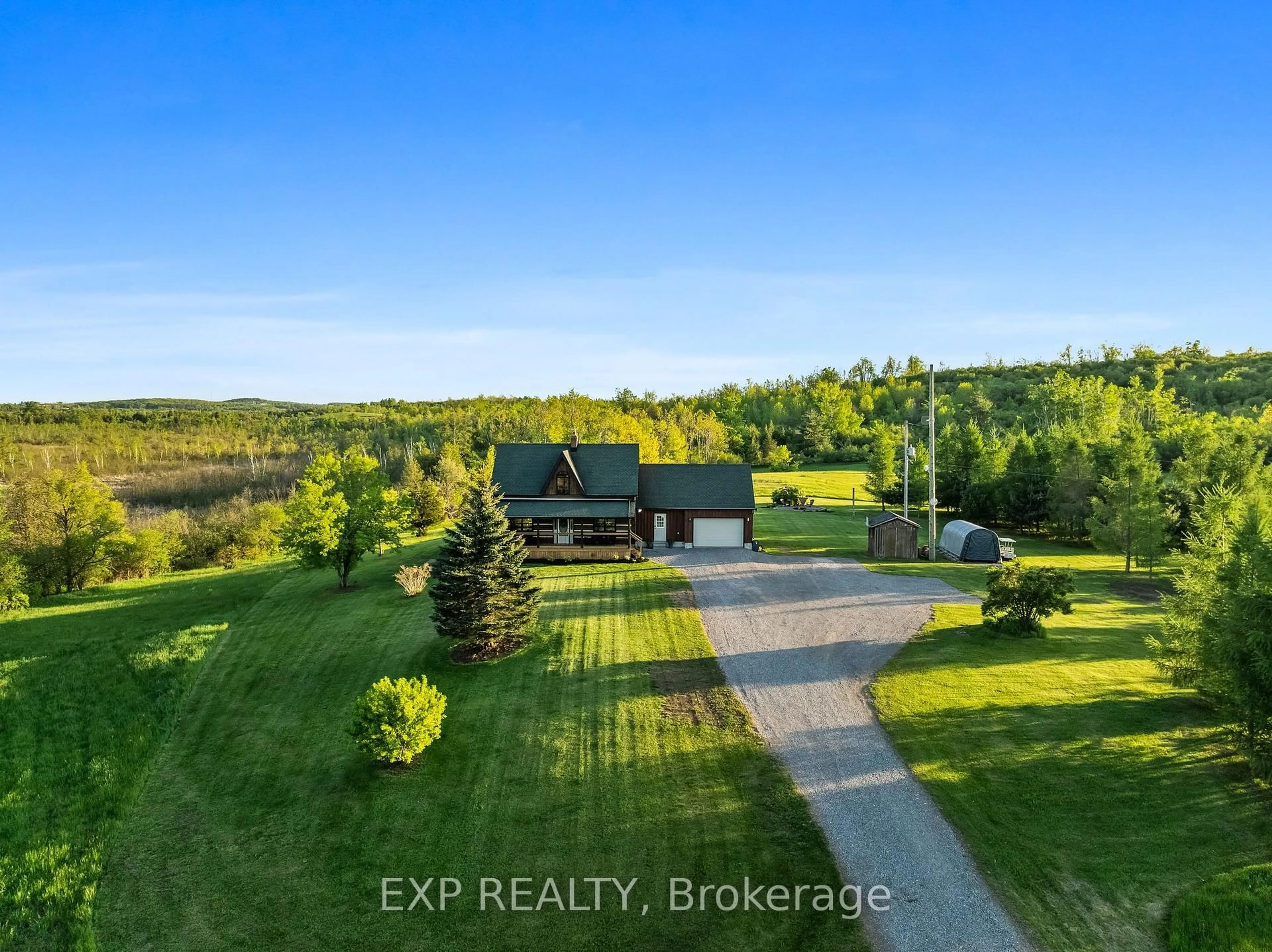 A pic from outside/outdoor area/front of a property/back of a property/a pic from drone, water/lake/river/ocean view for 278 Valley Rd, Kawartha Lakes Ontario K0L 2W0