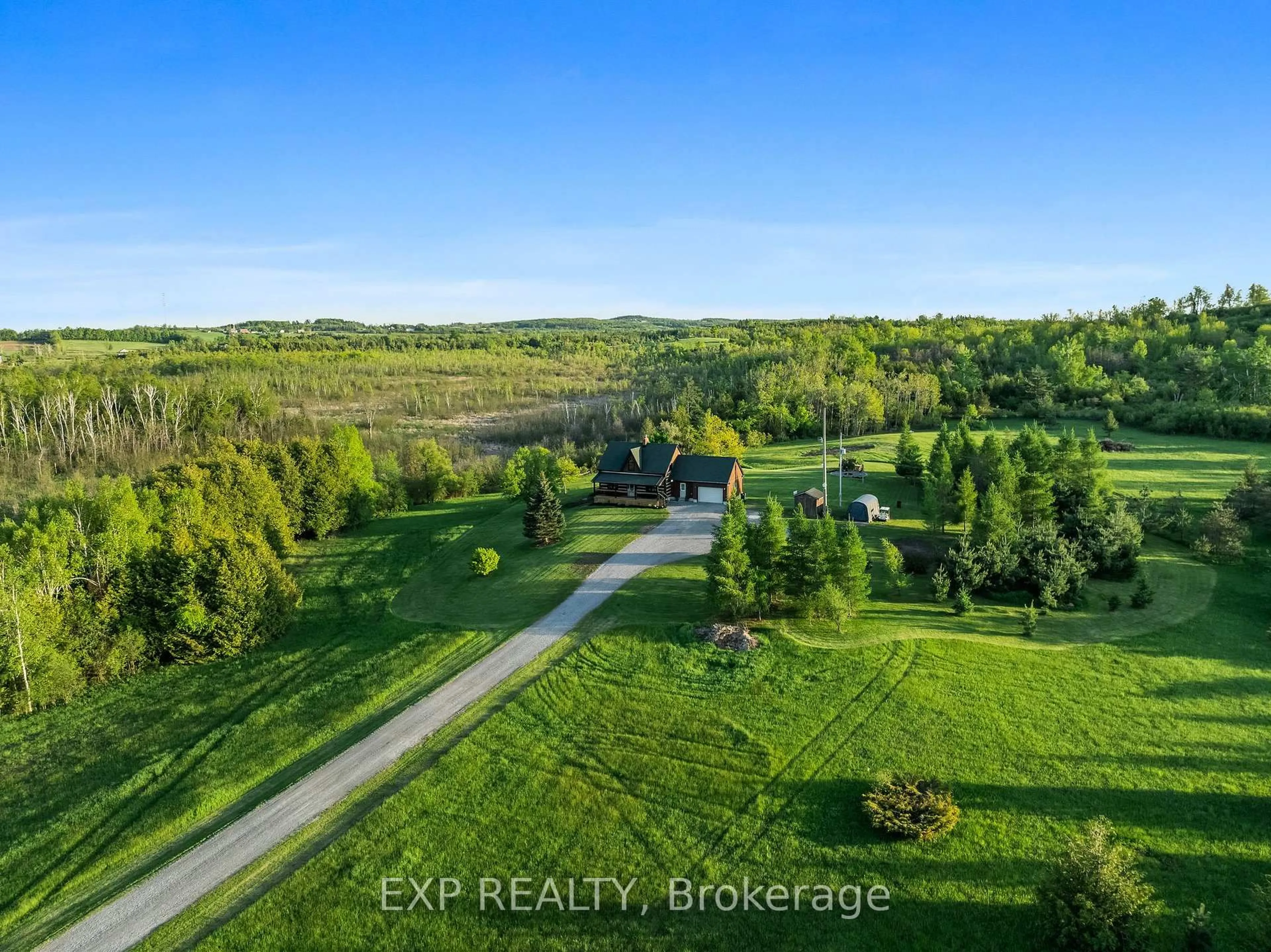 A pic from outside/outdoor area/front of a property/back of a property/a pic from drone, forest/trees view for 278 Valley Rd, Kawartha Lakes Ontario K0L 2W0