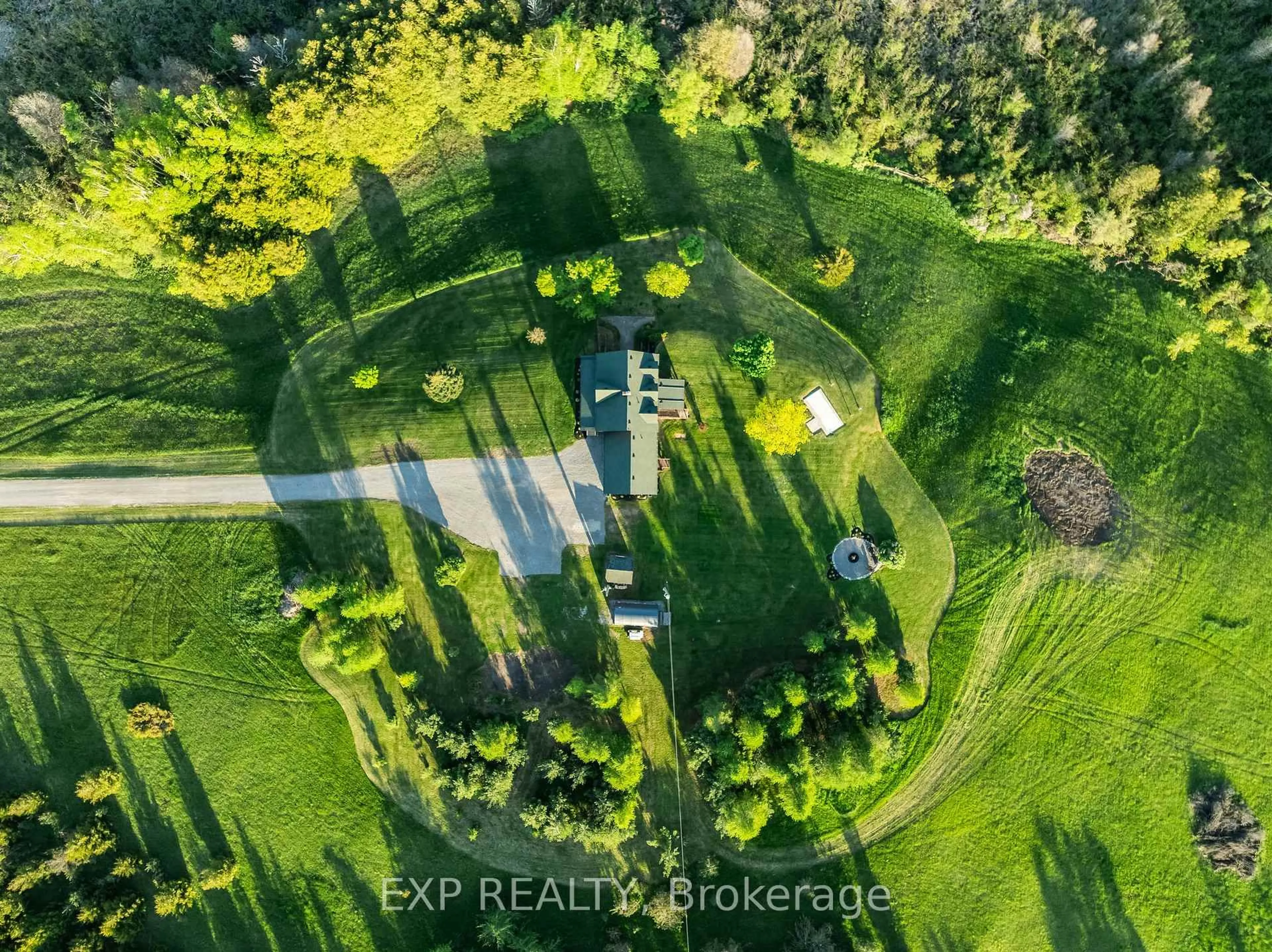 A pic from outside/outdoor area/front of a property/back of a property/a pic from drone, forest/trees view for 278 Valley Rd, Kawartha Lakes Ontario K0L 2W0
