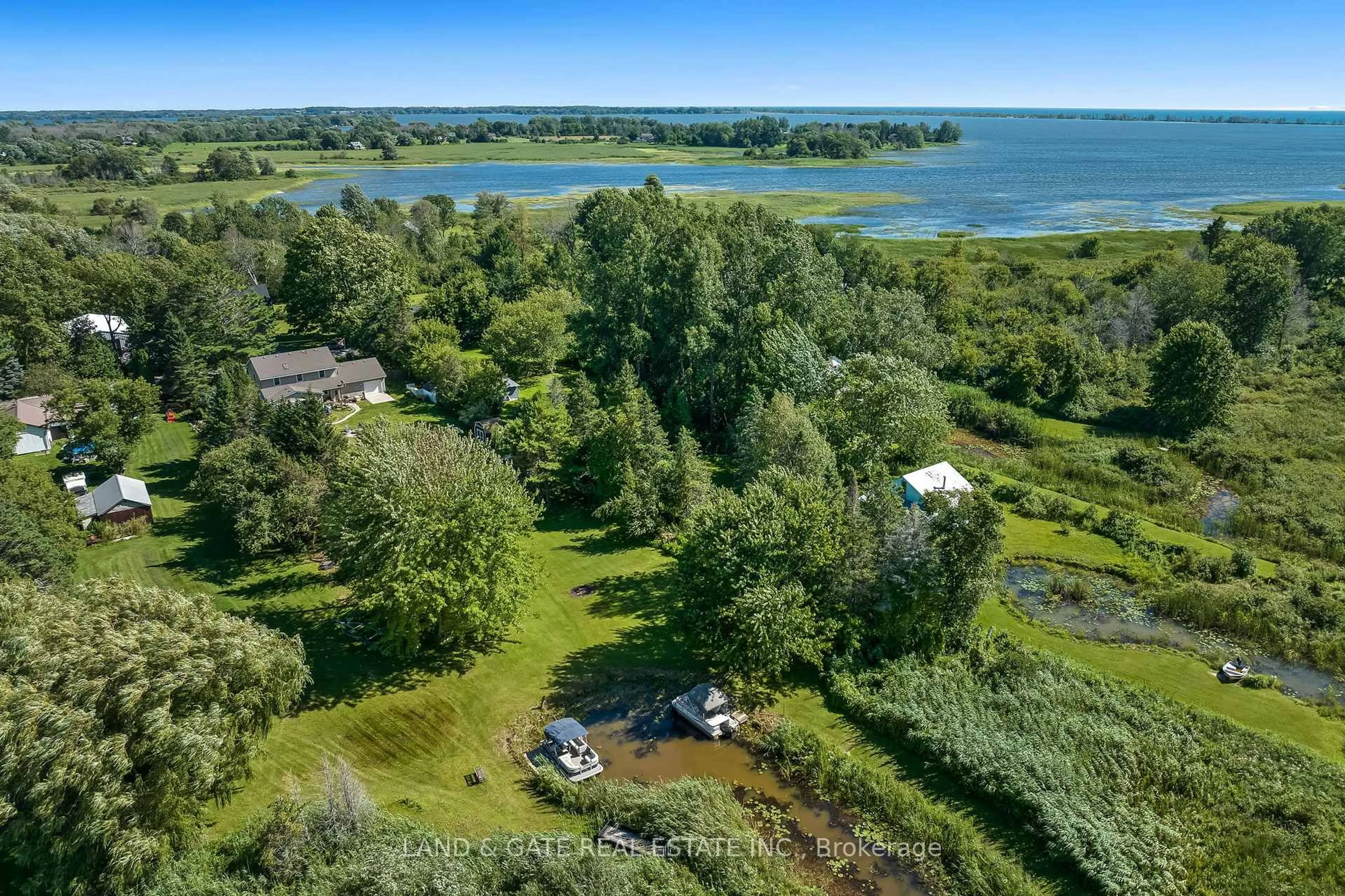 A pic from outside/outdoor area/front of a property/back of a property/a pic from drone, water/lake/river/ocean view for 184 Harbard Rd, Prince Edward County Ontario K0K 1L0