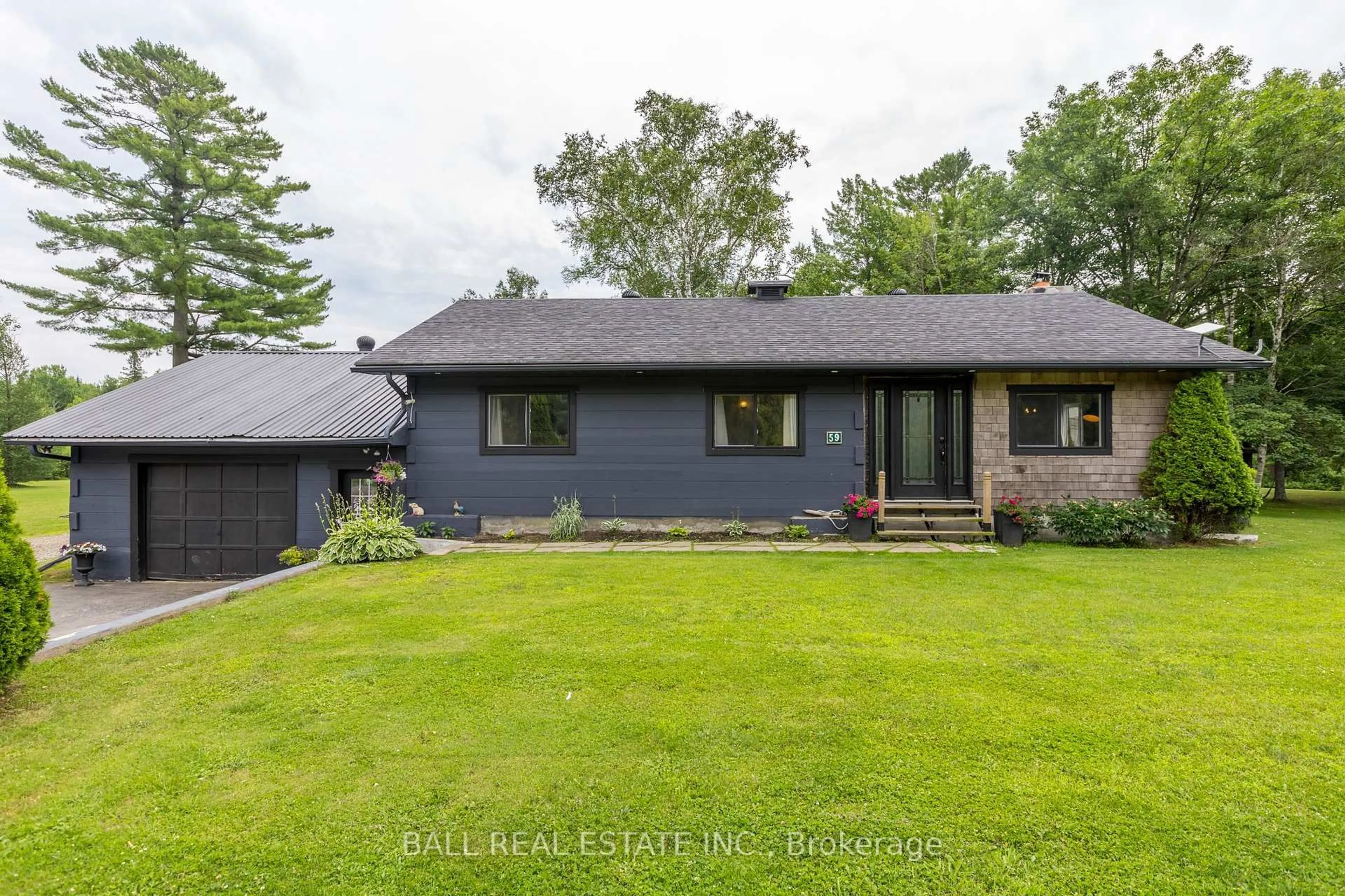 A pic from outside/outdoor area/front of a property/back of a property/a pic from drone, street for 59 Trotters Rd, North Kawartha Ontario K0L 1A0