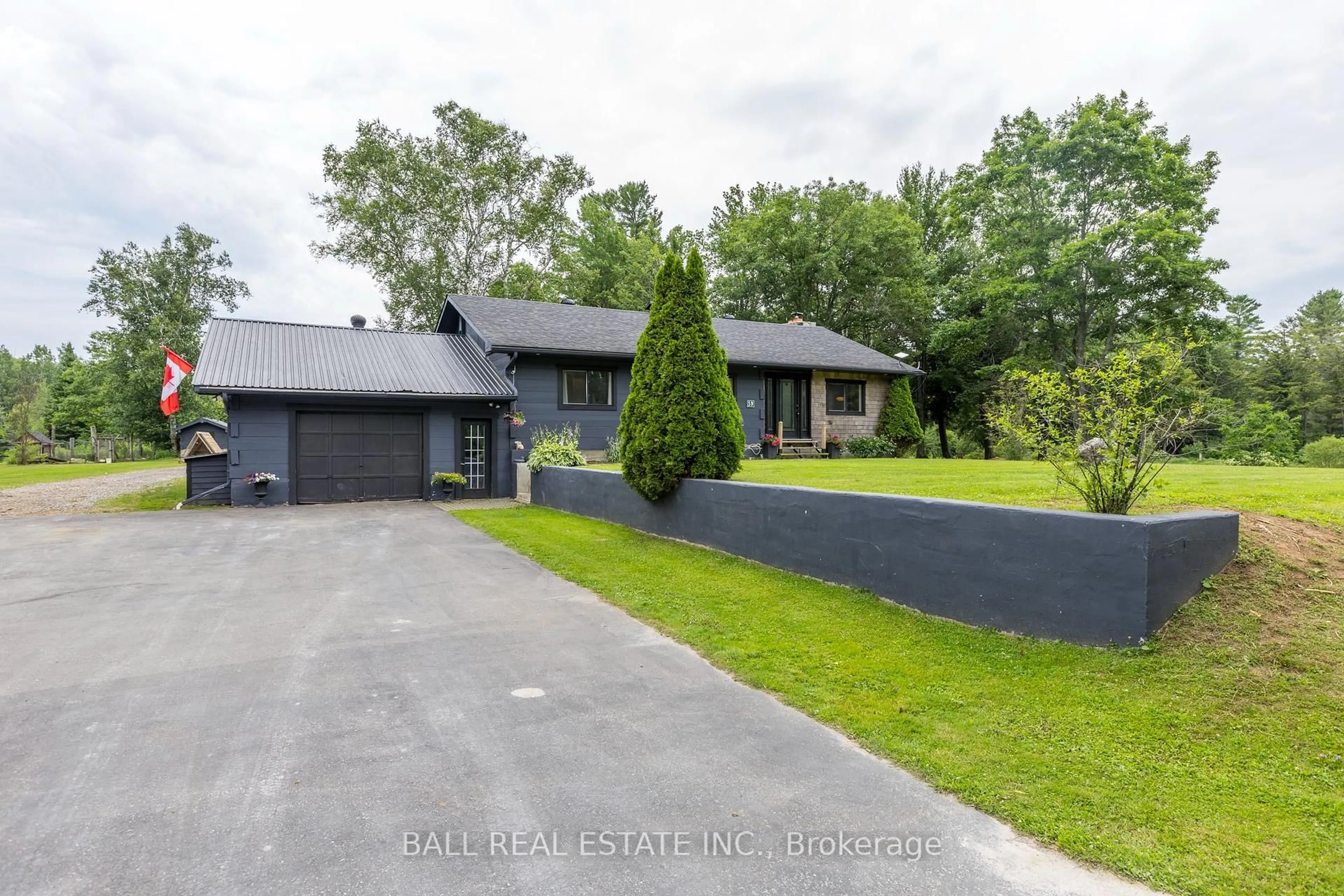 A pic from outside/outdoor area/front of a property/back of a property/a pic from drone, street for 59 Trotters Rd, North Kawartha Ontario K0L 1A0