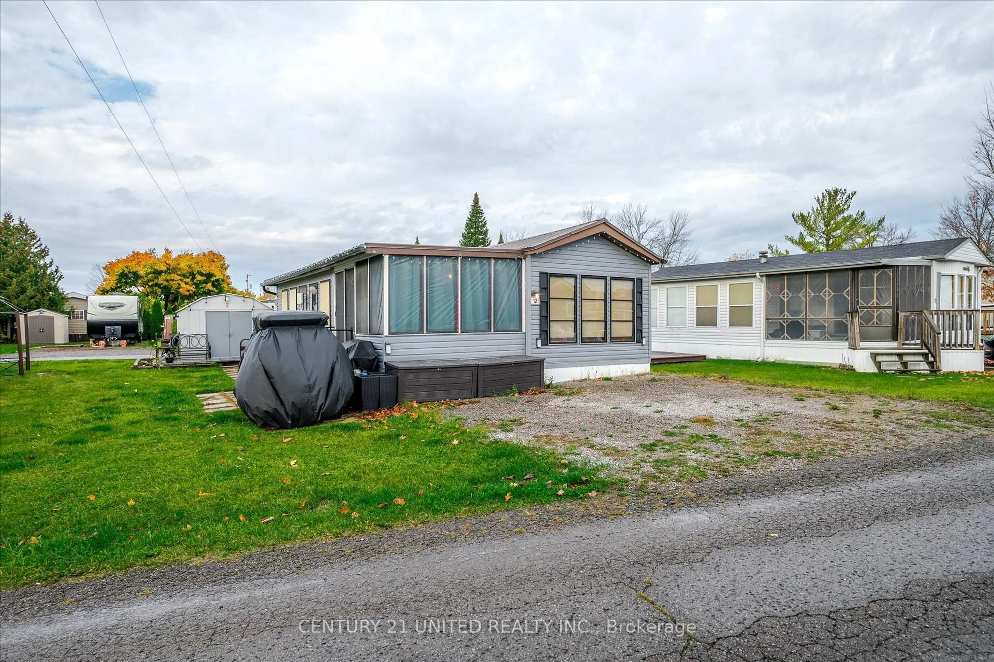 A pic from outside/outdoor area/front of a property/back of a property/a pic from drone, street for 12 Tyler Dr, Otonabee-South Monaghan Ontario K0L 2G0