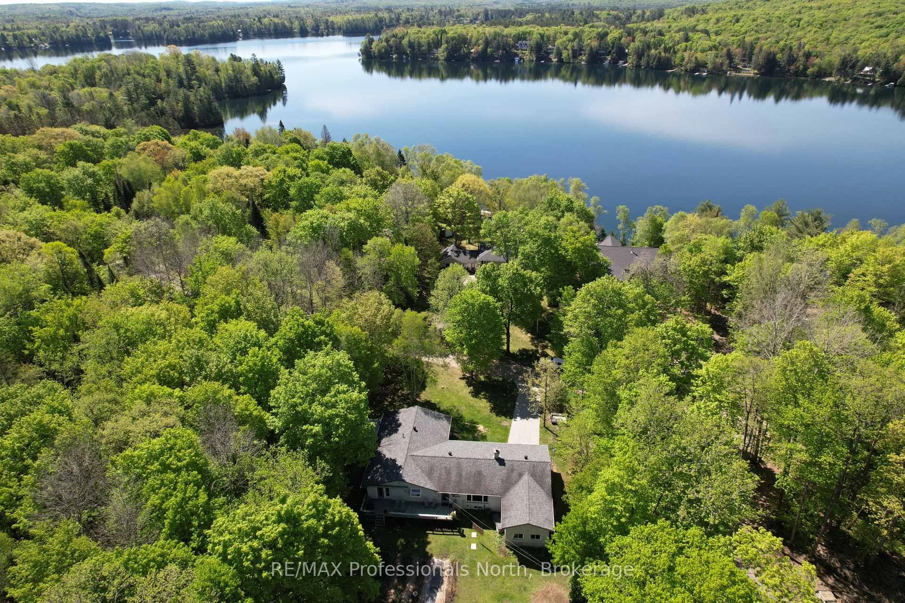 A pic from outside/outdoor area/front of a property/back of a property/a pic from drone, water/lake/river/ocean view for 553 Homeland Dr Dr, Perry Ontario P0A 1J0
