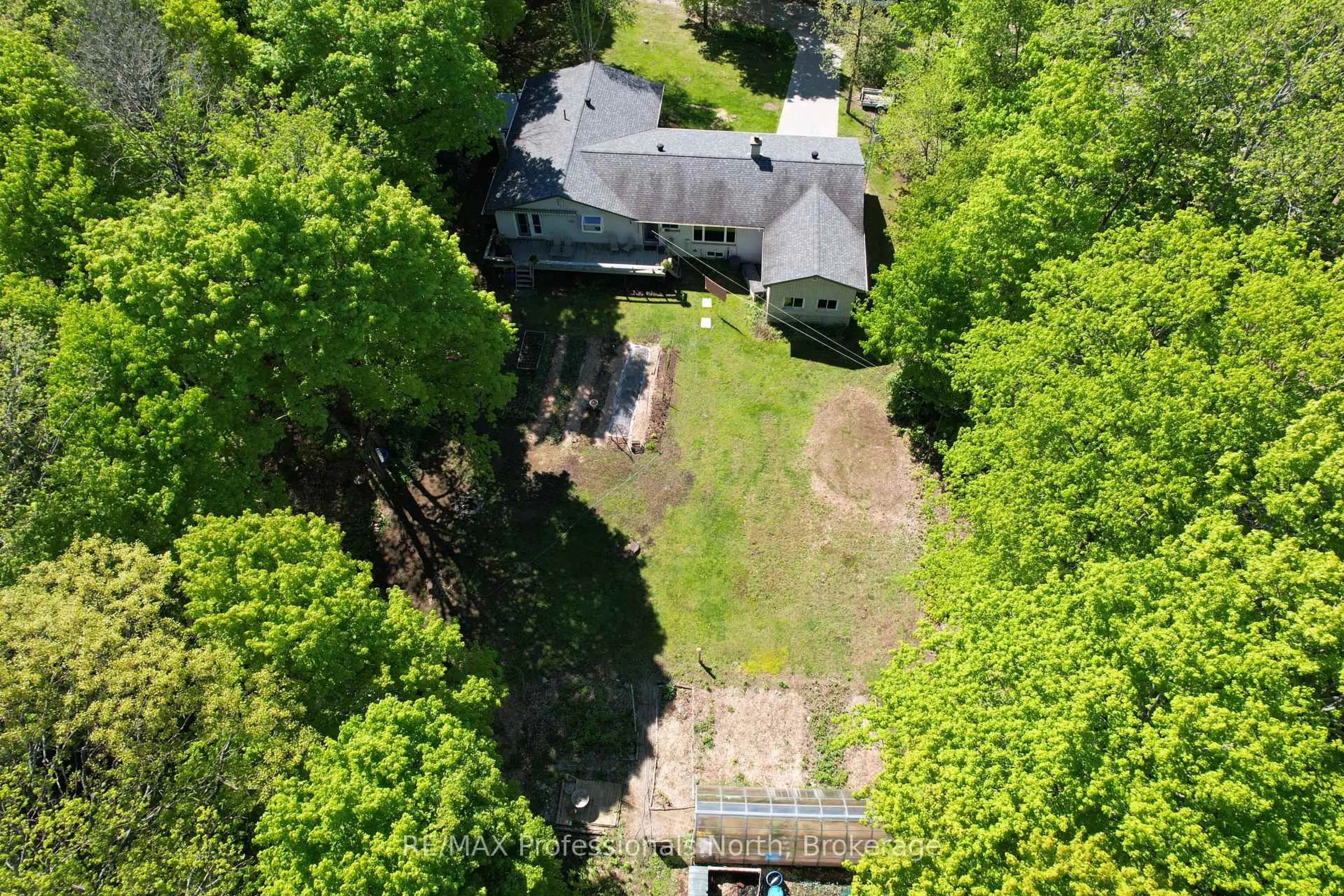 A pic from outside/outdoor area/front of a property/back of a property/a pic from drone, forest/trees view for 553 Homeland Dr Dr, Perry Ontario P0A 1J0