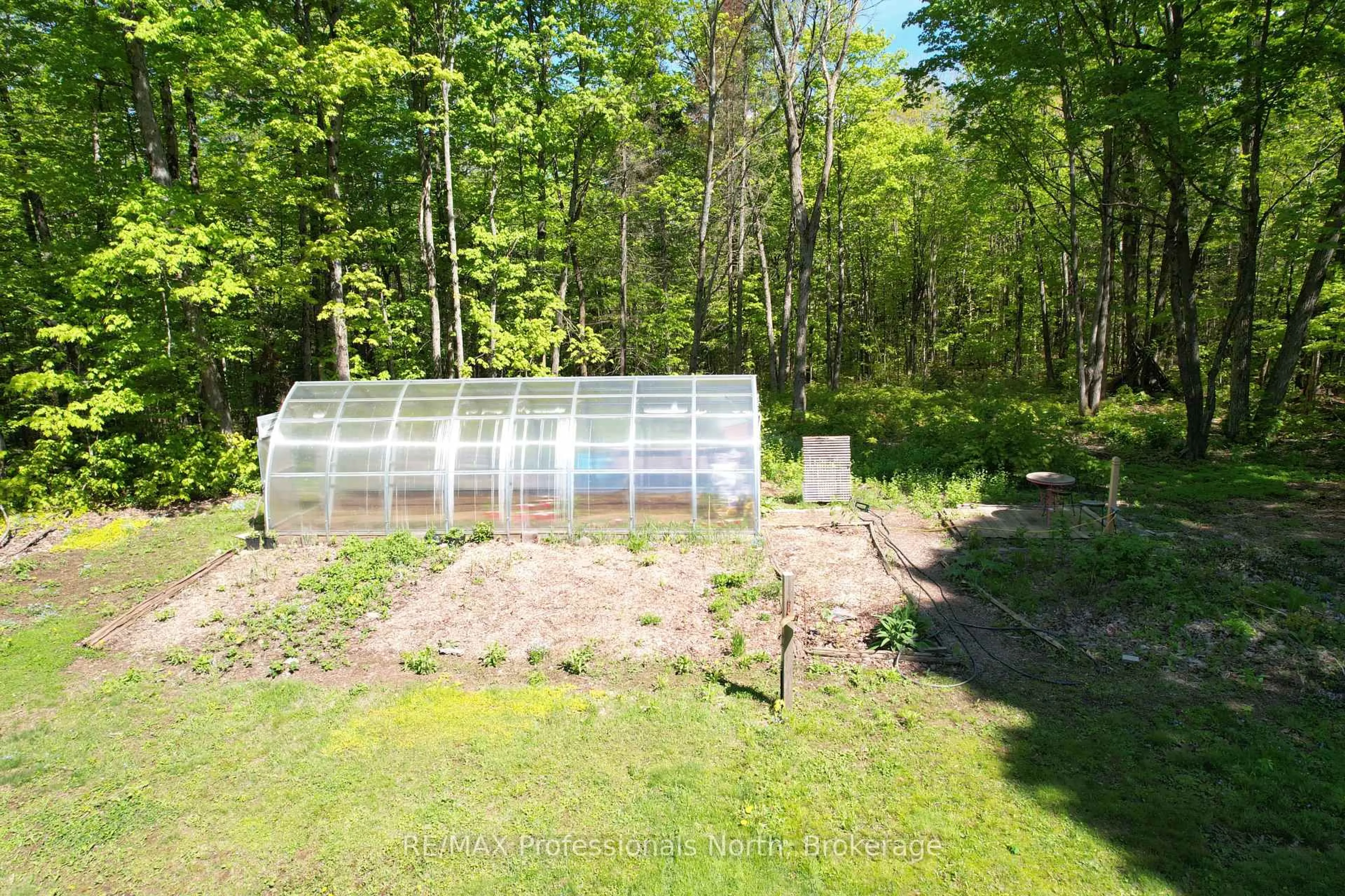 A pic from outside/outdoor area/front of a property/back of a property/a pic from drone, forest/trees view for 553 Homeland Dr Dr, Perry Ontario P0A 1J0