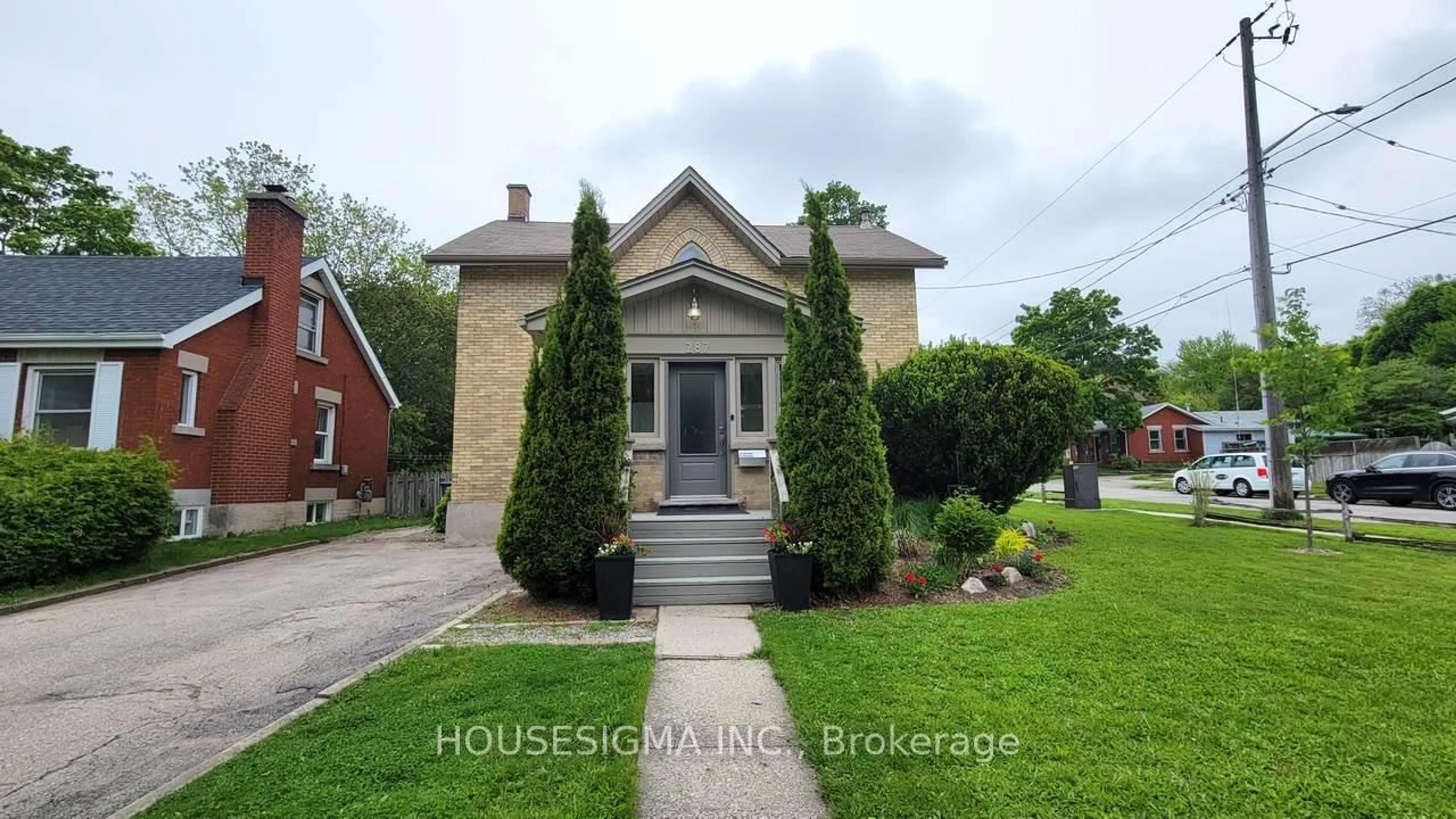 Home with brick exterior material, street for 287 Waterloo Ave, Guelph Ontario N1H 5V7