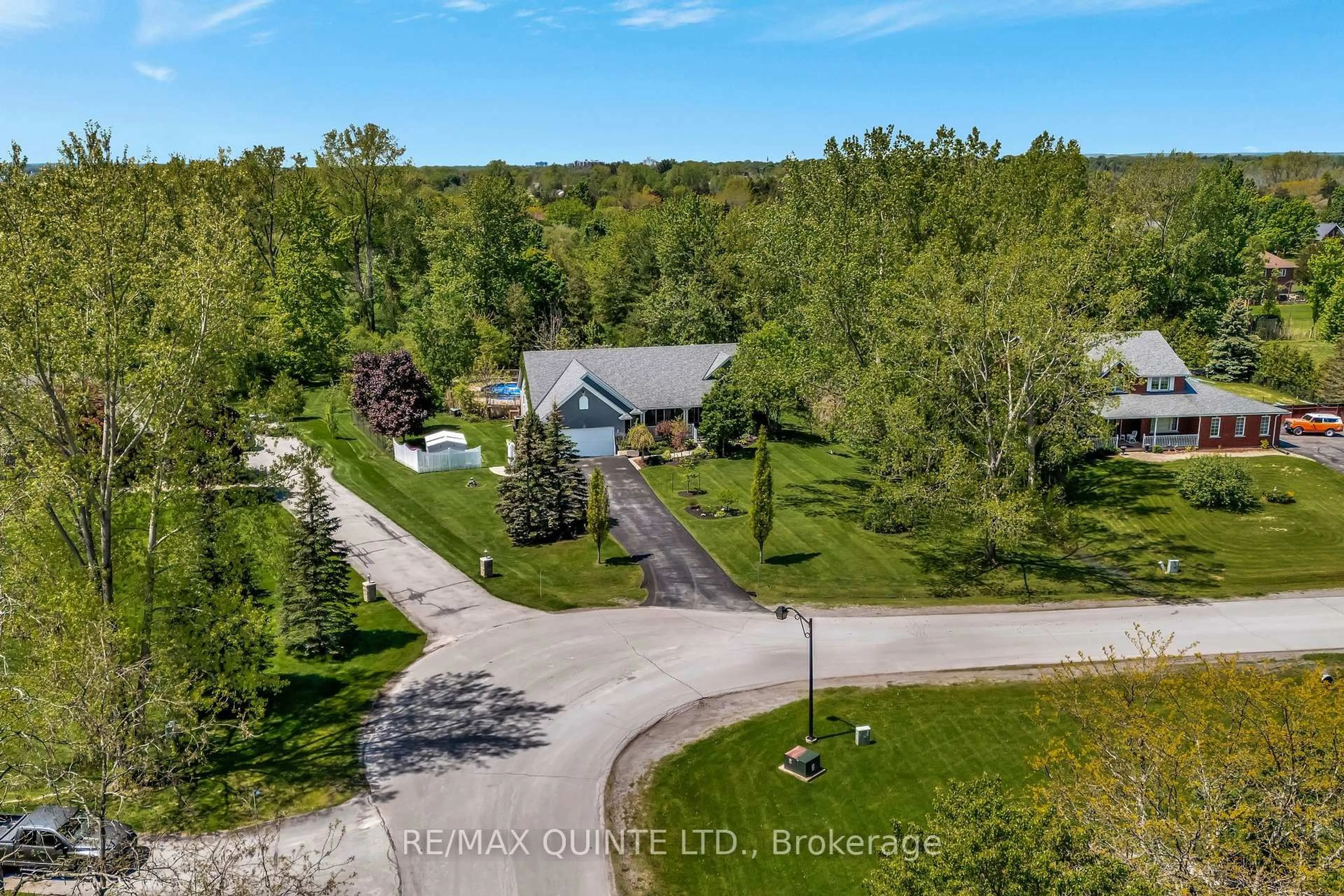 A pic from outside/outdoor area/front of a property/back of a property/a pic from drone, water/lake/river/ocean view for 50 Penny Lane, Belleville Ontario K8N 4Z4