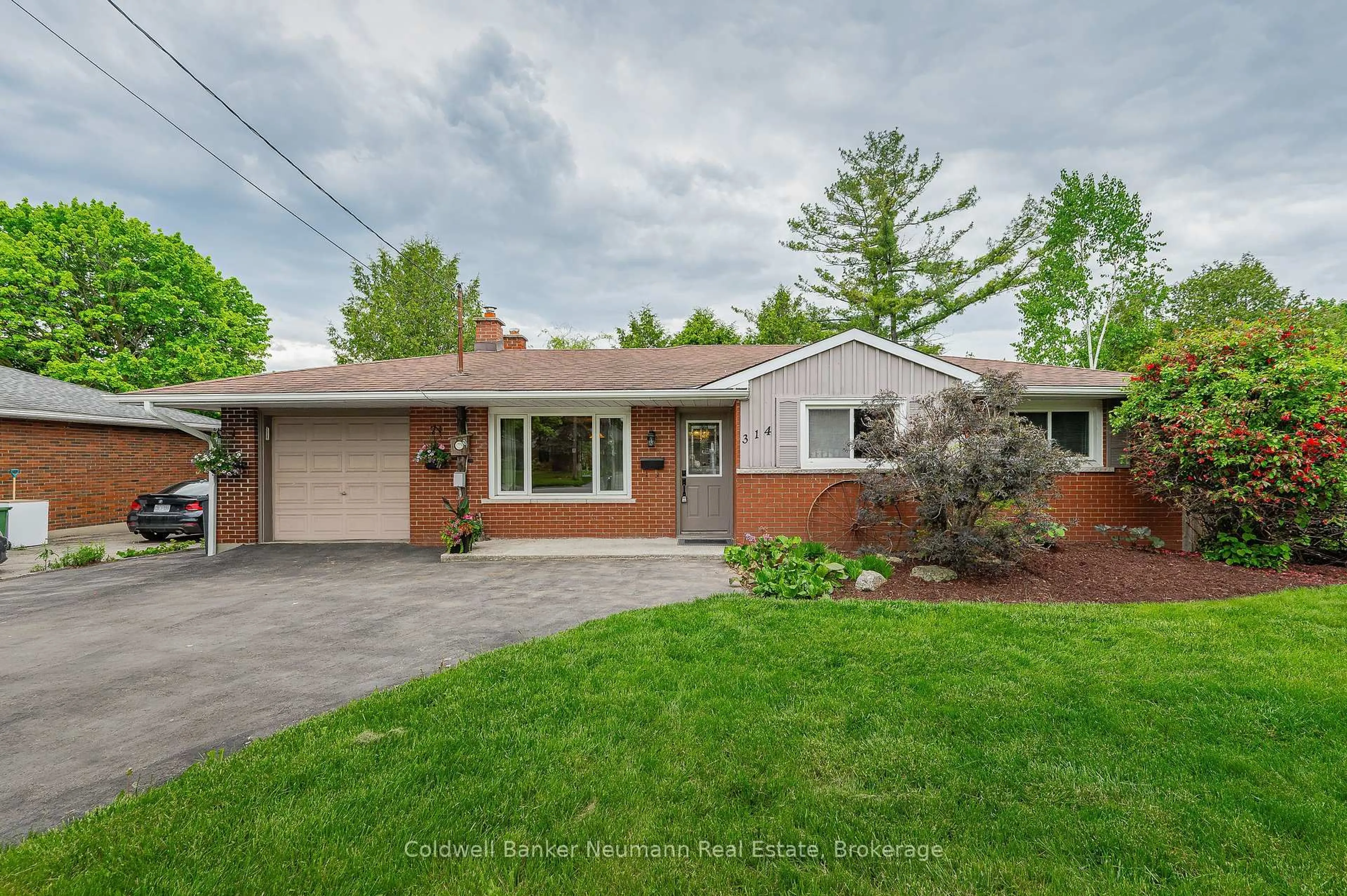 Home with brick exterior material, street for 314 Victoria Rd, Guelph Ontario N1E 5J4
