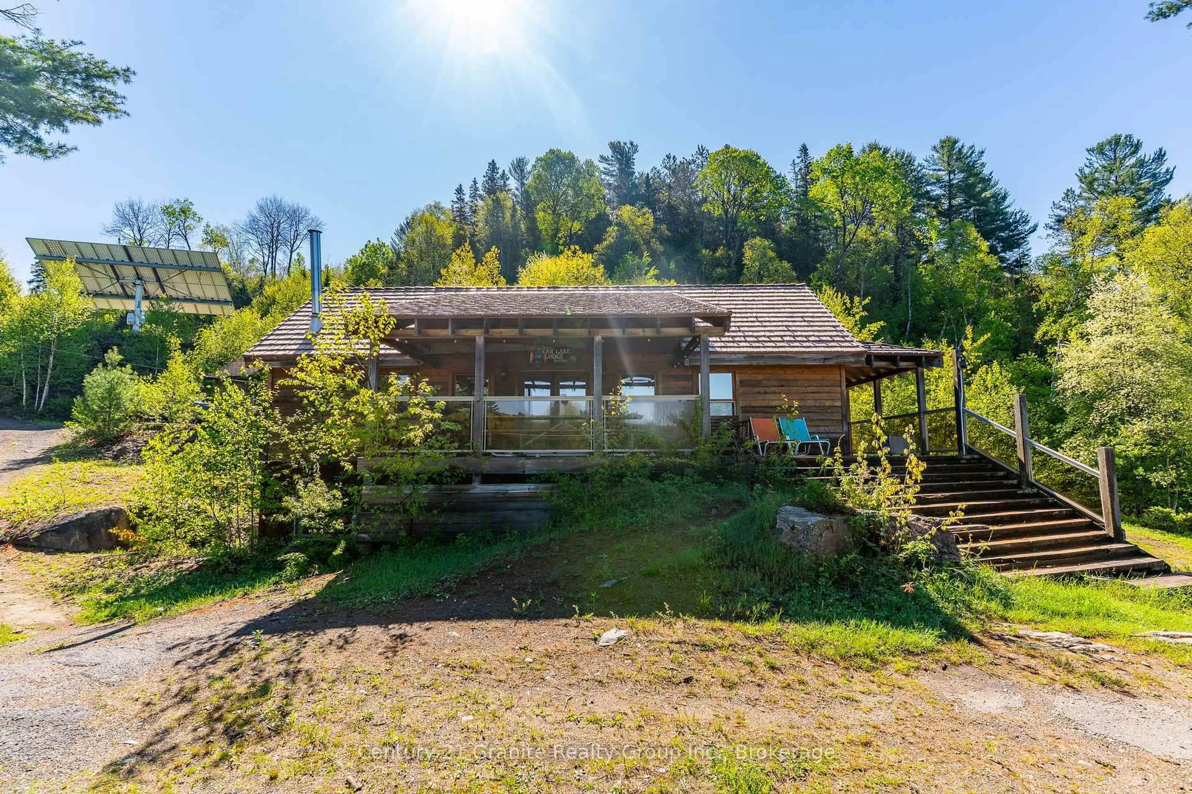 A pic from outside/outdoor area/front of a property/back of a property/a pic from drone, unknown for 1226 Trapline Tr, Dysart et al Ontario K0M 1S0
