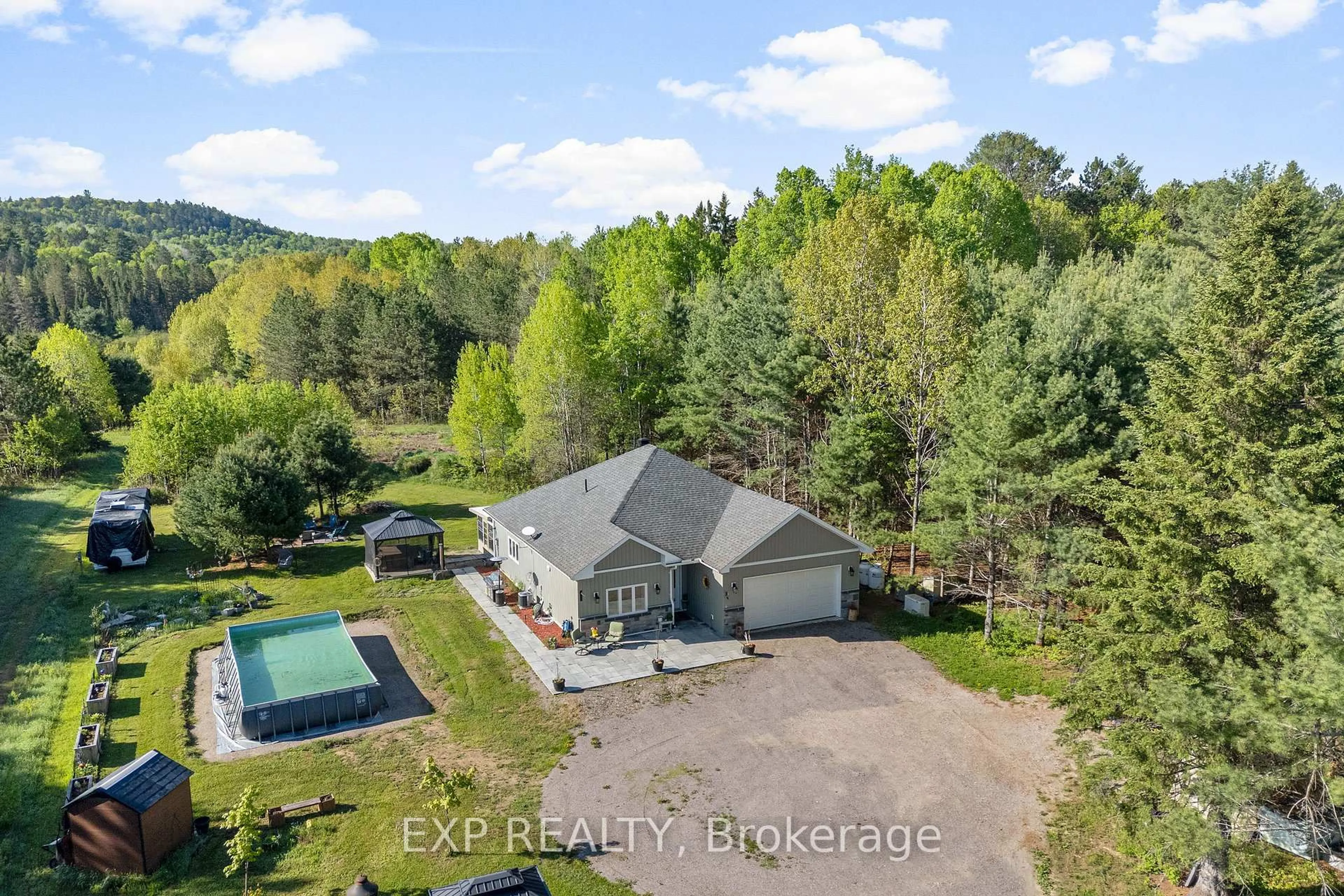 A pic from outside/outdoor area/front of a property/back of a property/a pic from drone, water/lake/river/ocean view for 12 Eastern Ave, Griffith Ontario K0J 2R0