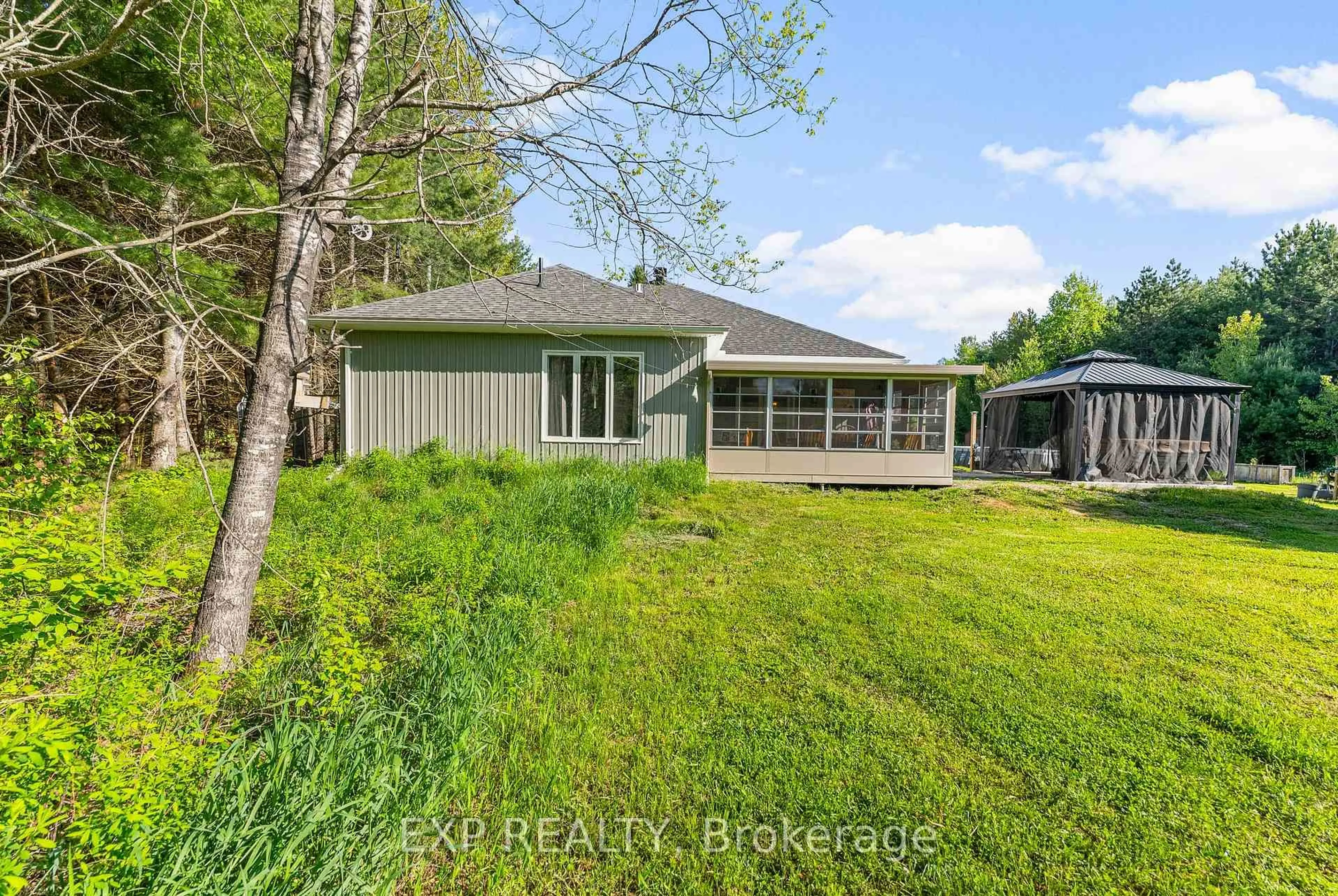 A pic from outside/outdoor area/front of a property/back of a property/a pic from drone, water/lake/river/ocean view for 12 Eastern Ave, Griffith Ontario K0J 2R0