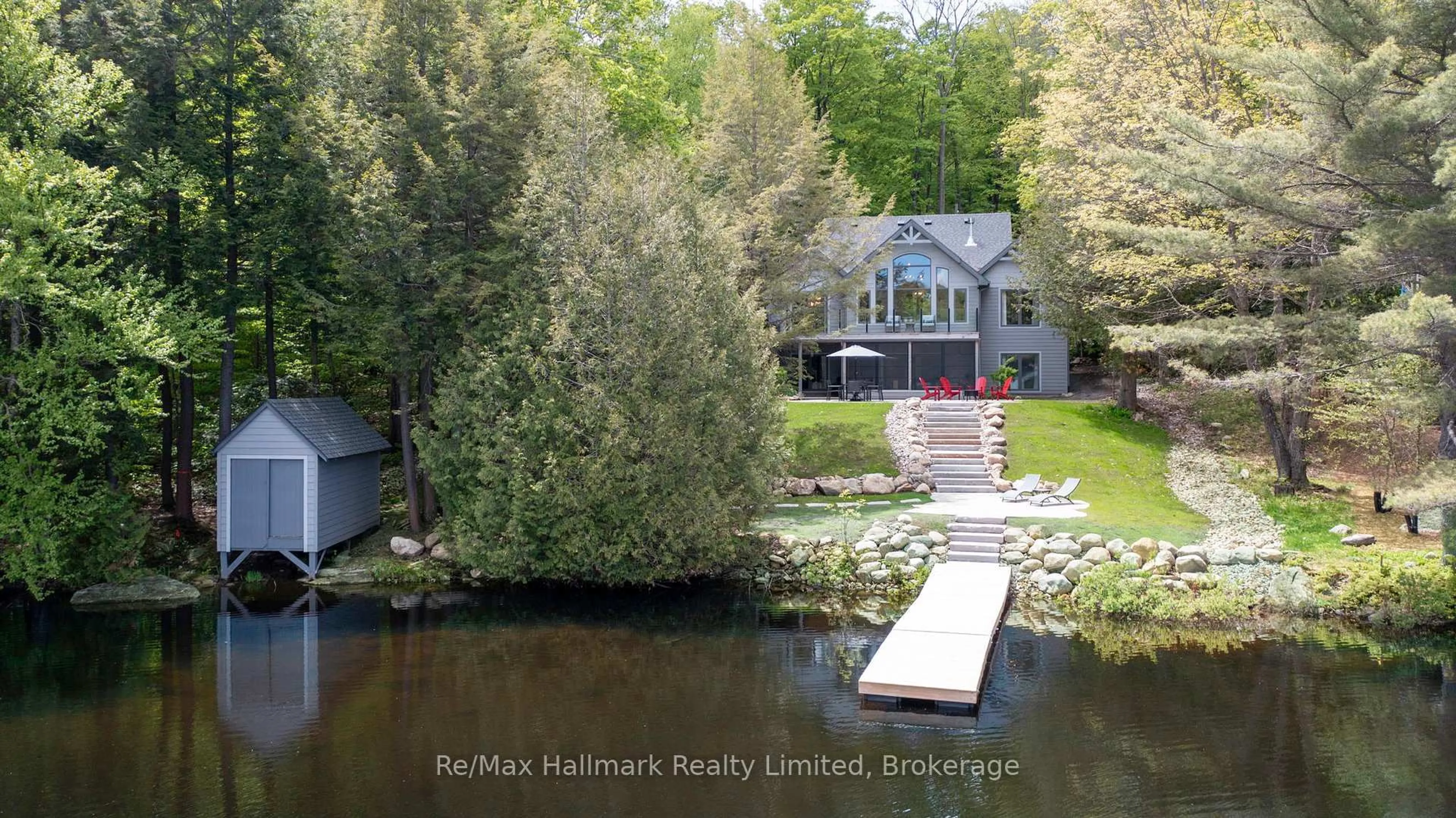 A pic from outside/outdoor area/front of a property/back of a property/a pic from drone, water/lake/river/ocean view for 1088 Lawson Rd, Lake of Bays Ontario P0B 1A0