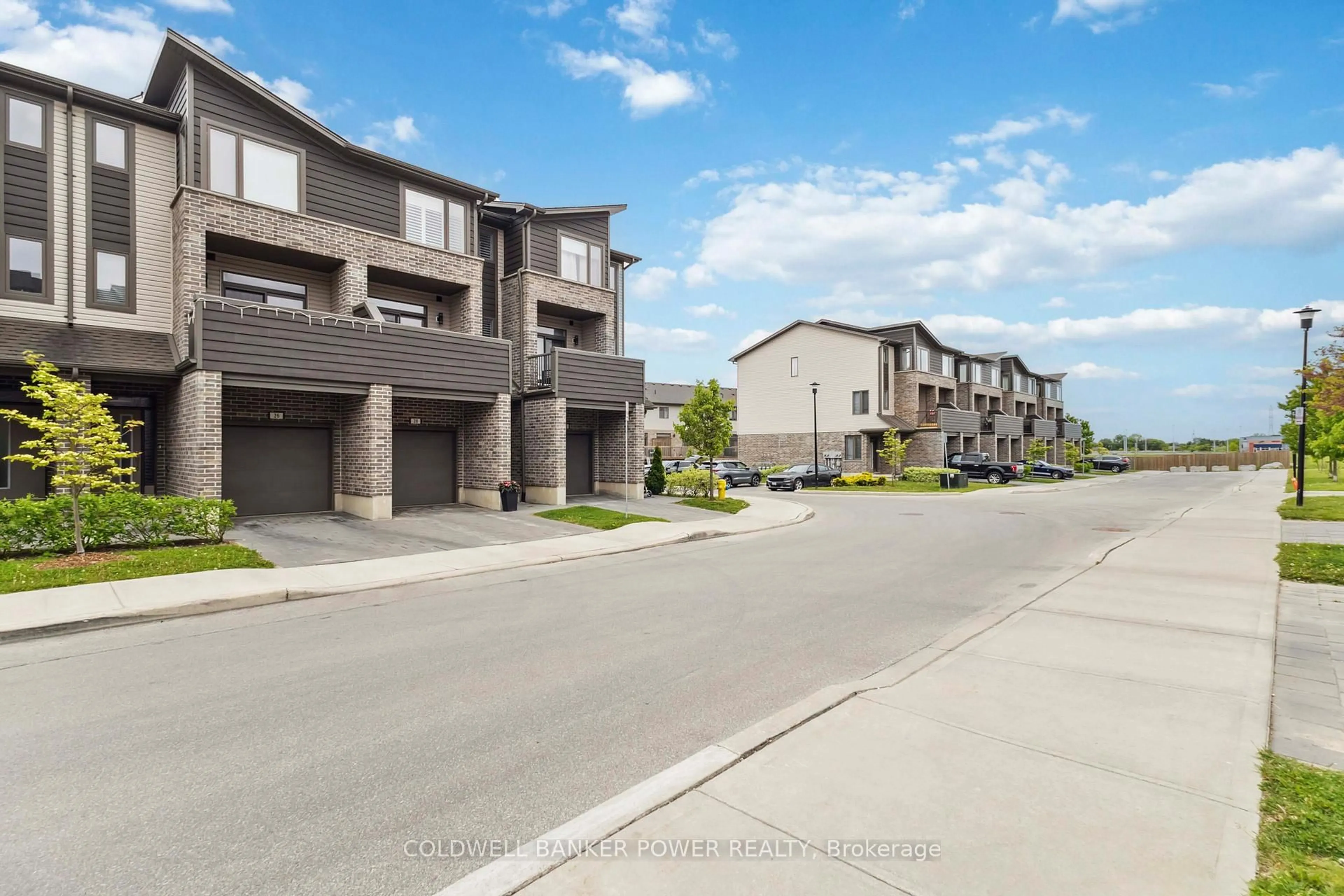 A pic from outside/outdoor area/front of a property/back of a property/a pic from drone, street for 2070 Meadowgate Blvd #28, London South Ontario N6M 1K1