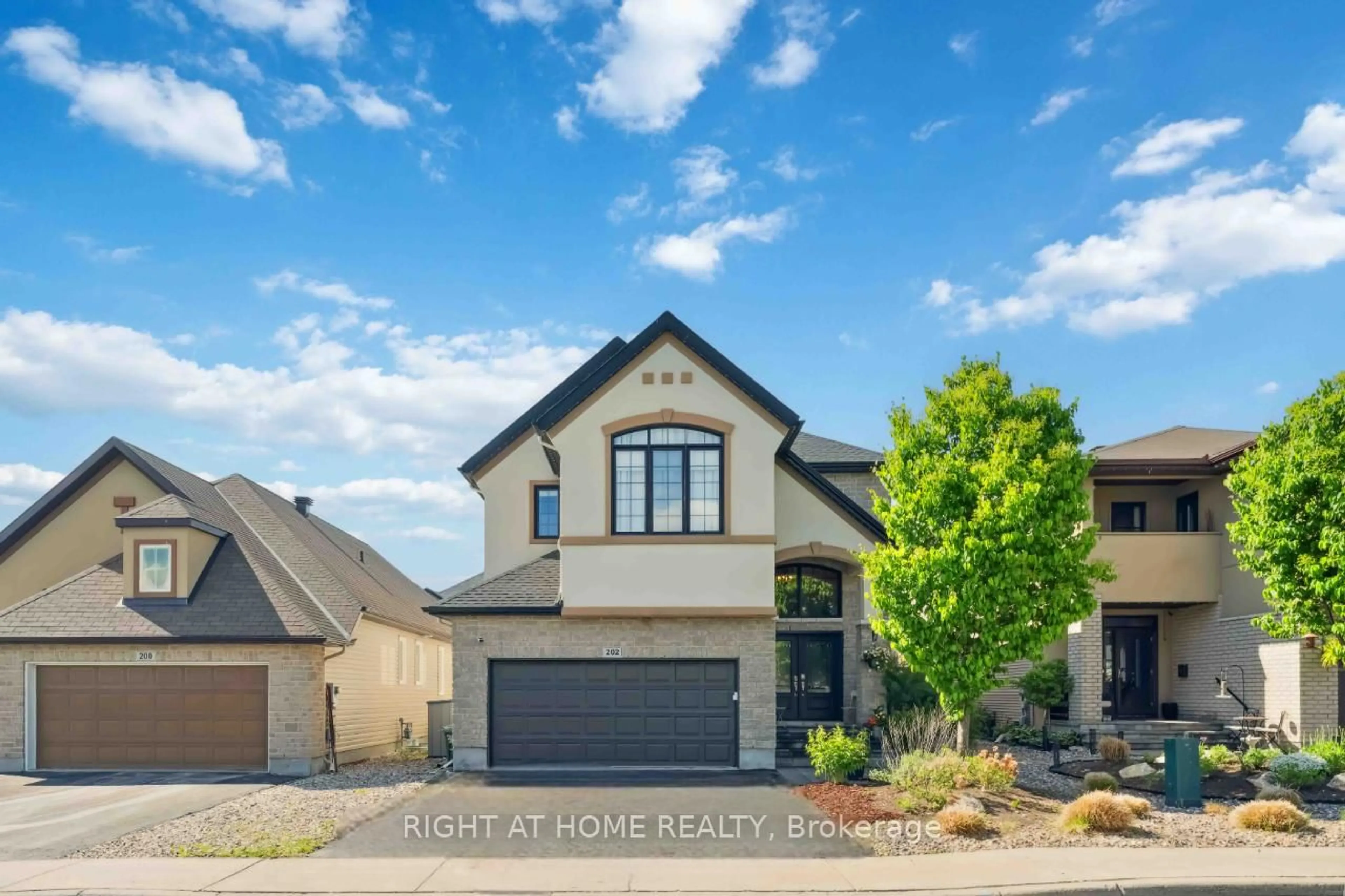 Home with brick exterior material, street for 202 Balikun Hts, Stittsville Ontario K2V 0A6