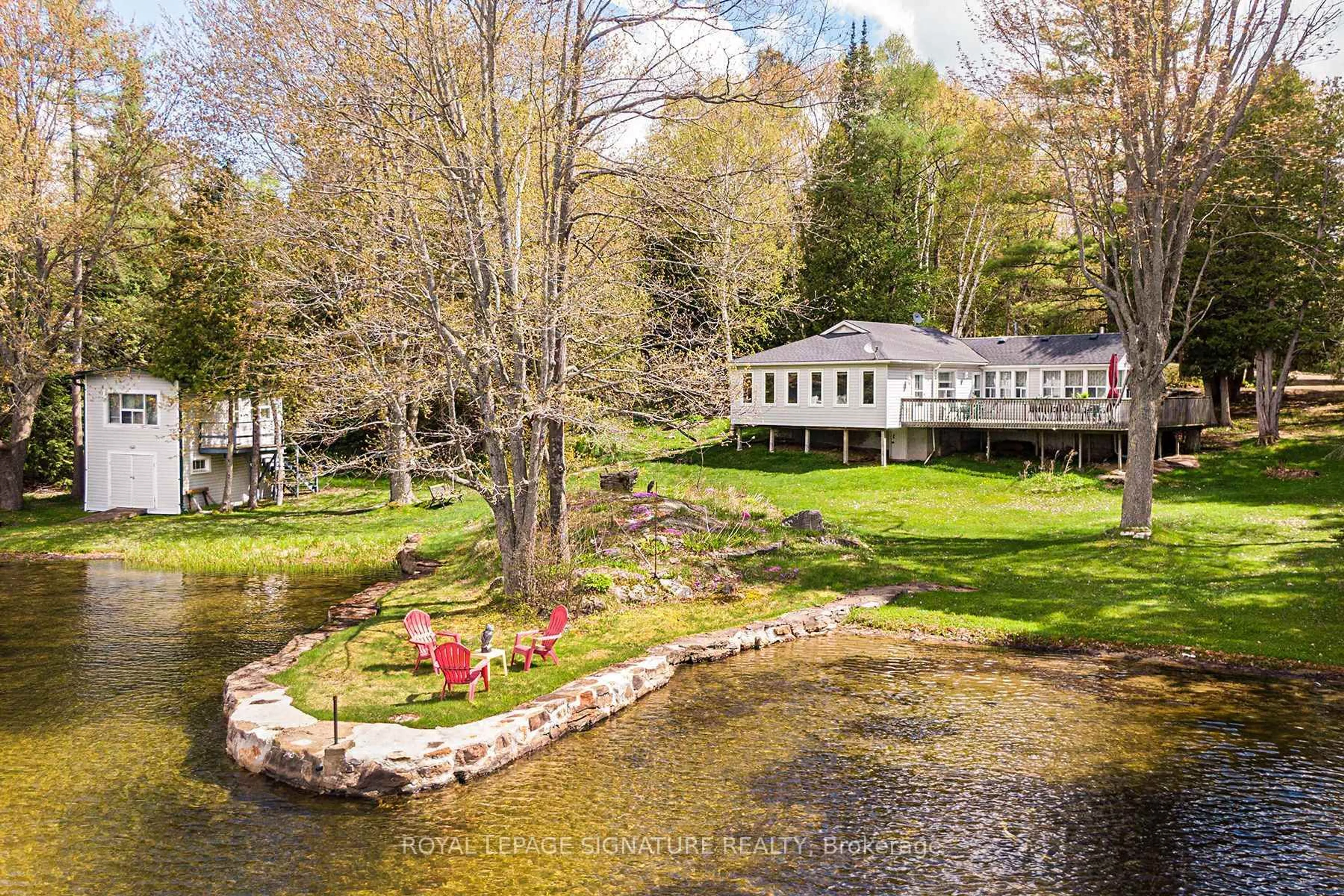 A pic from outside/outdoor area/front of a property/back of a property/a pic from drone, water/lake/river/ocean view for 1270 Wessell Rd, Minden Hills Ontario K0M 2L1