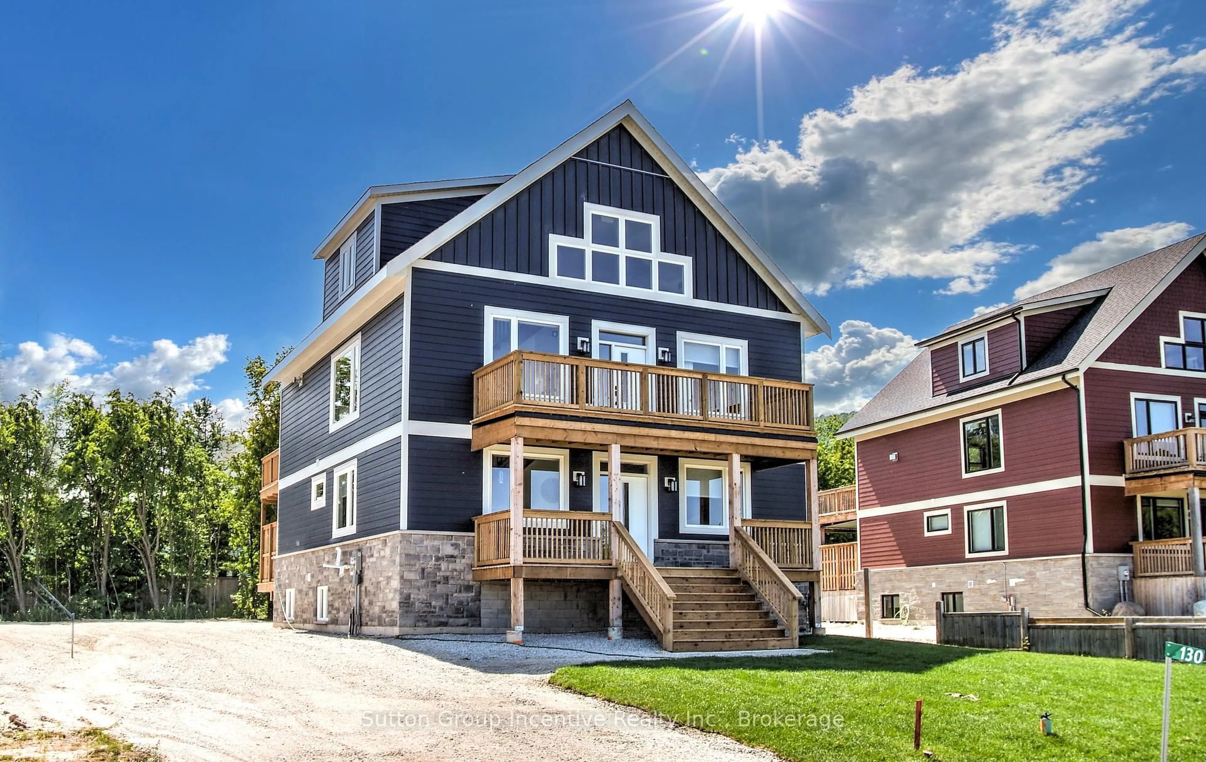 Home with brick exterior material, street for 130 Arlberg Cres, Blue Mountains Ontario L9Y 0M1