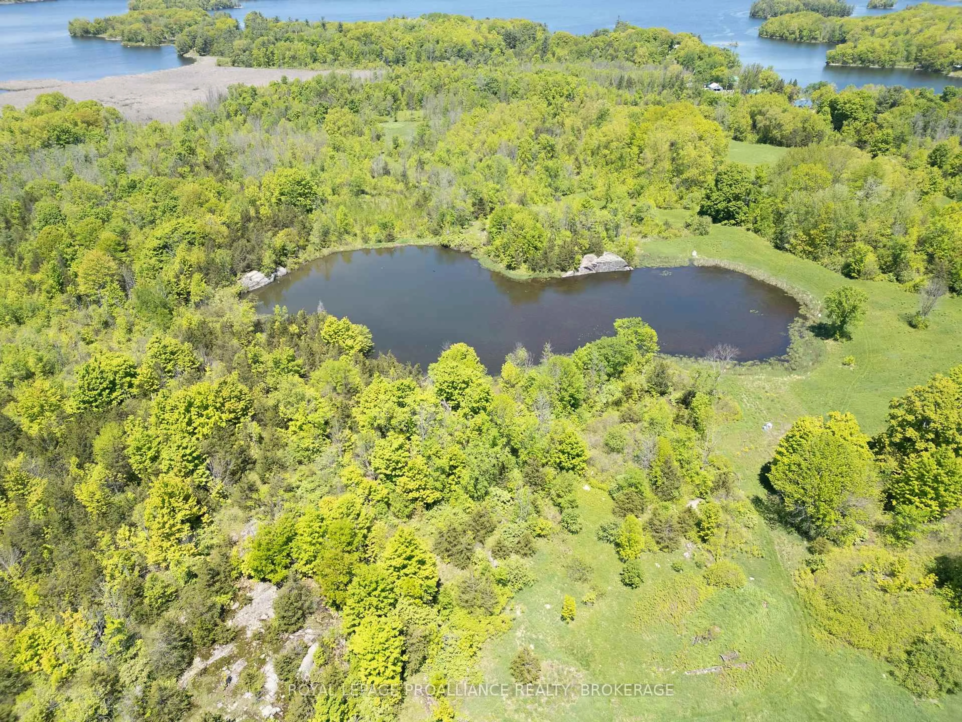 A pic from outside/outdoor area/front of a property/back of a property/a pic from drone, water/lake/river/ocean view for 1122 Gananoque Lake Rd, Front of Leeds & Seeleys Bay Ontario K7G 2V4