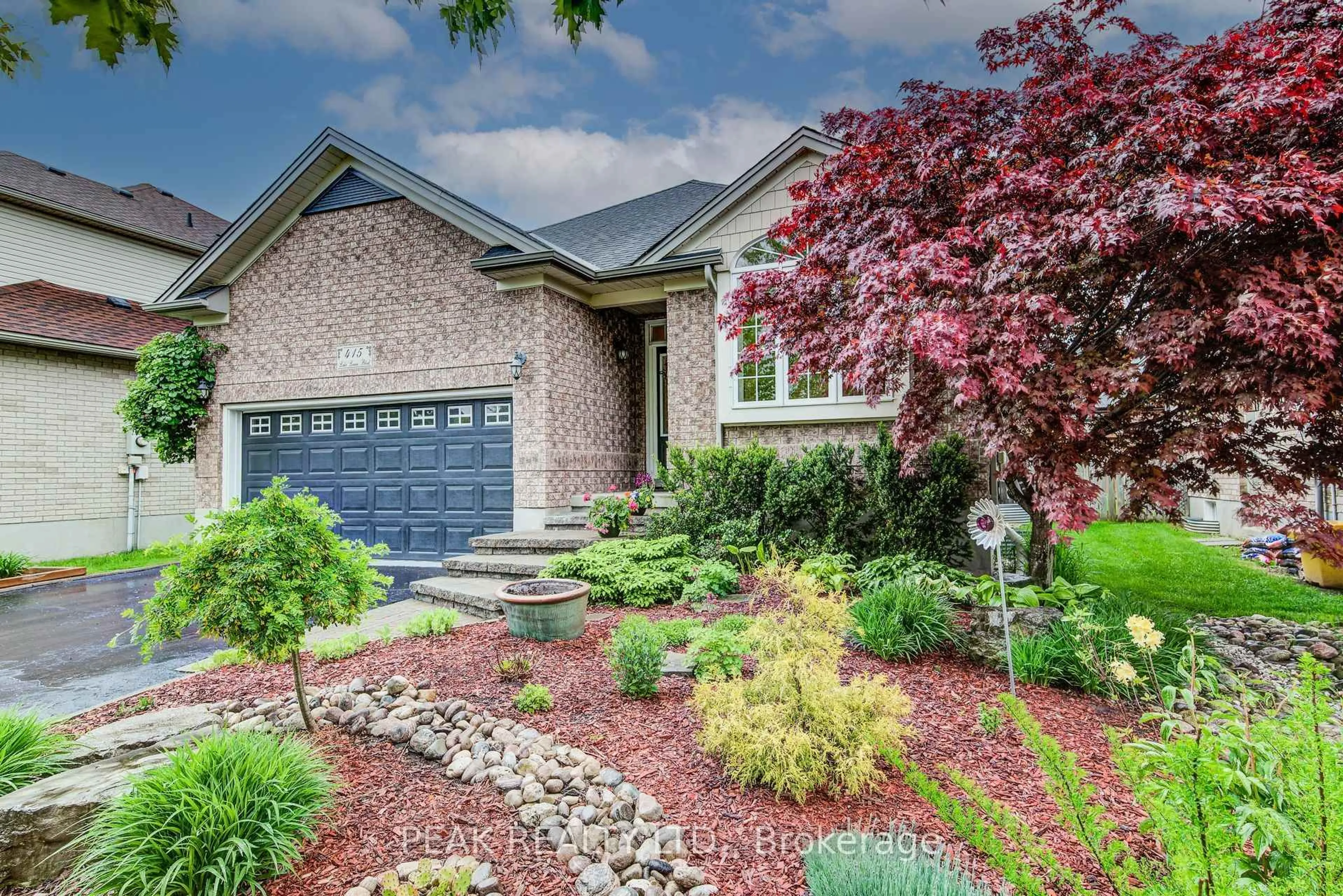 Home with brick exterior material, street for 415 Lake Louise Blvd, Waterloo Ontario N2V 2K4